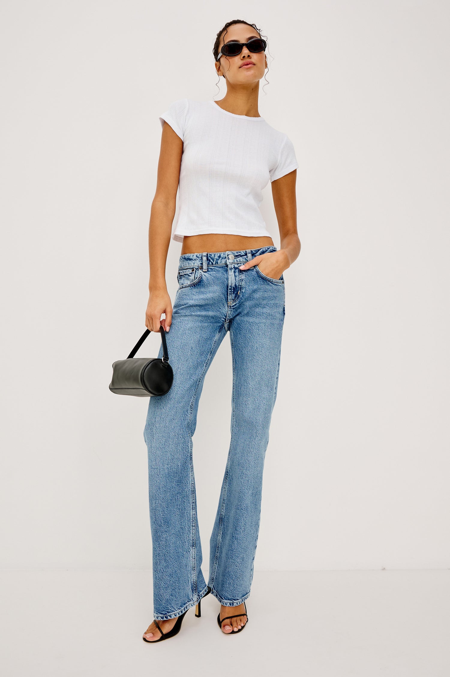 Fremont Bootcut Jean in Light Stretch Denim With 5-Pockets, Zip Fly, and 32″ Inseam in Old Indigo Colorway - Full Body Front View Featured on Model