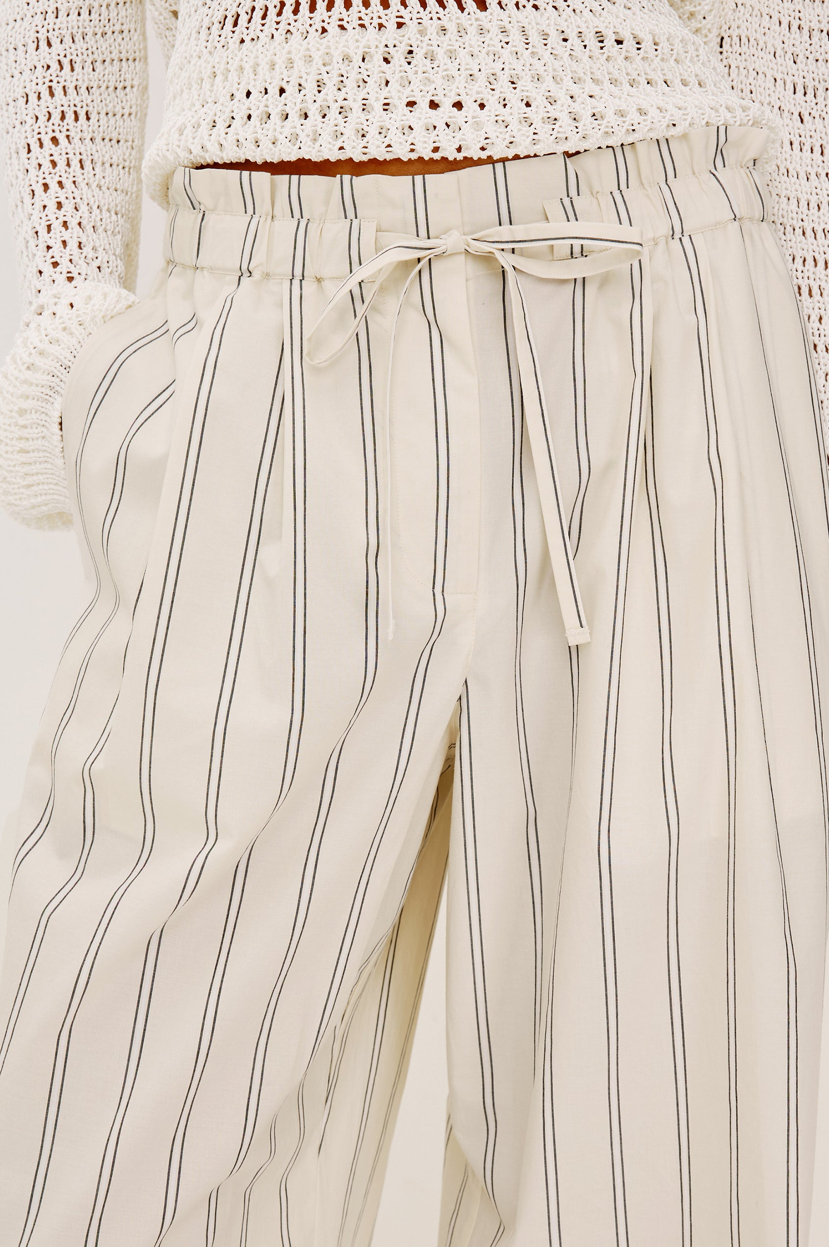 Fulham Pant in Cotton Poplin With Mid-Rise, Pleated Details, Zip Fly, and Back Pockets - Lower Body Front View Featured on Model