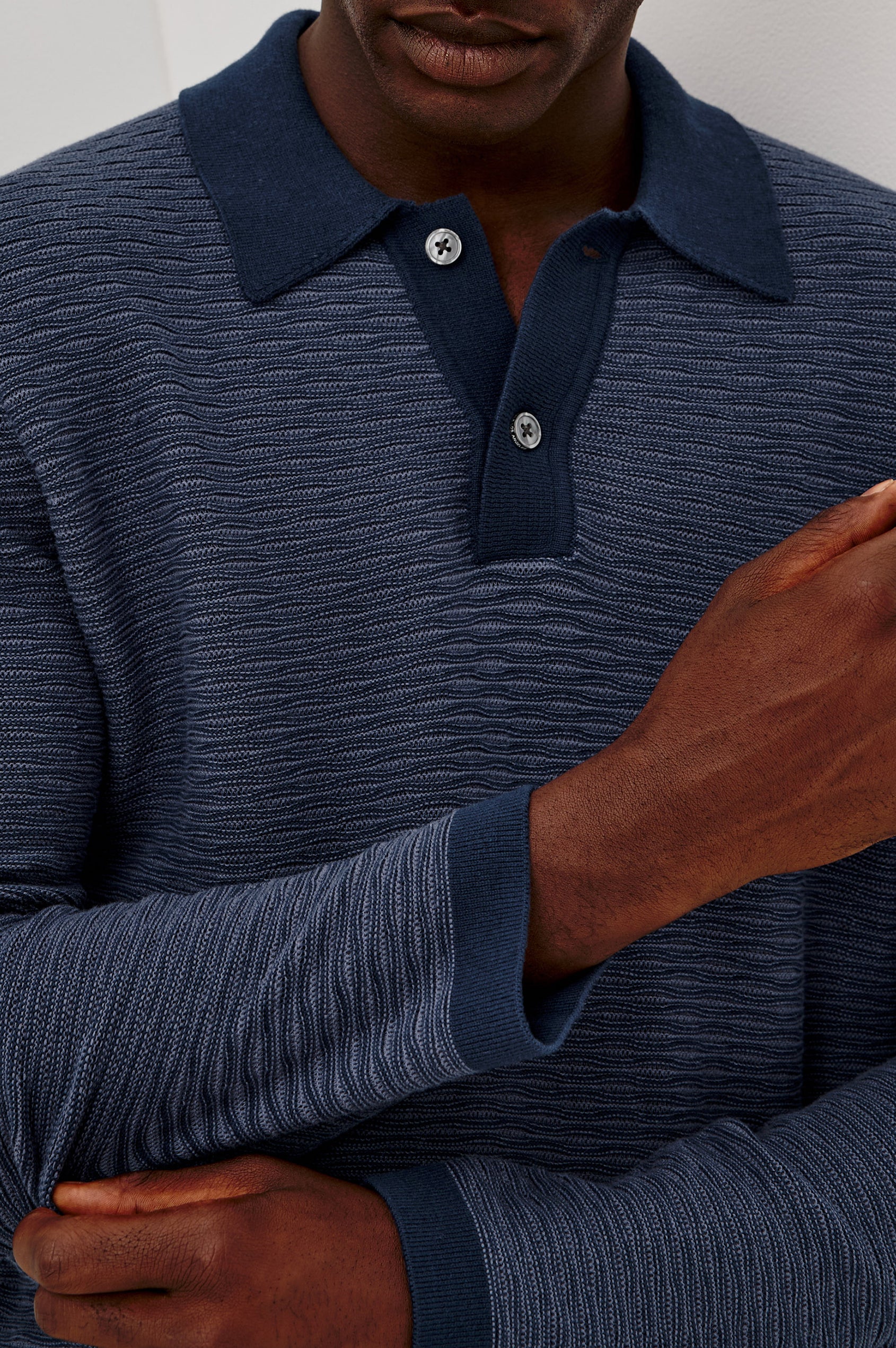 Fulton Sweater in Lightweight Cotton Knit With Raglan Long Sleeves, Two-Button Placket, Collar, and Tonal Texture in Navy Wave Colorway - Upper Body Front View Featured on Model