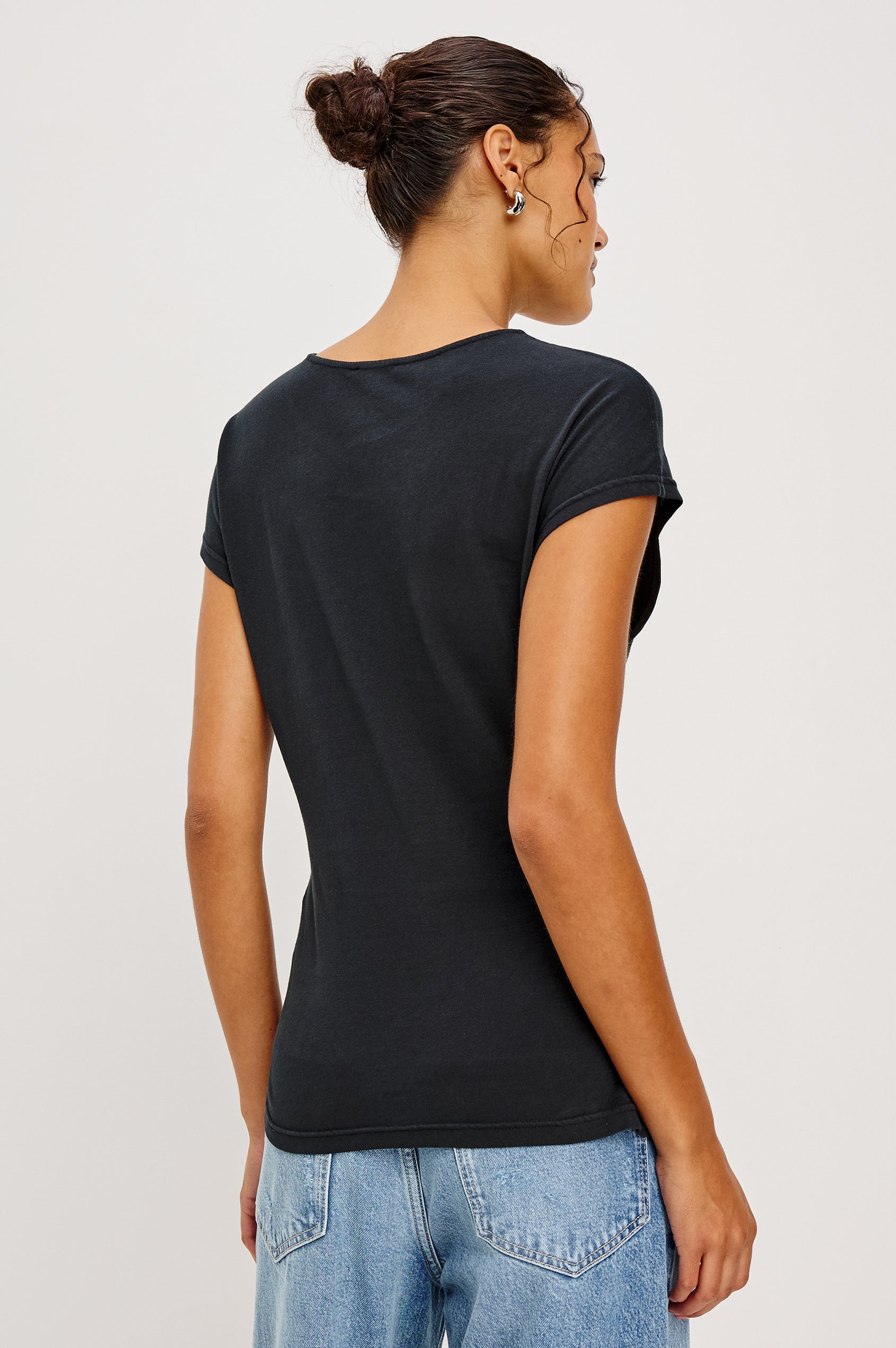 Gabbie Top in Cotton With Boat Neckline Dolman Cap Sleeves and Waist Wrap Ties in Black Colorway - Upper Body Back View Featured on Model