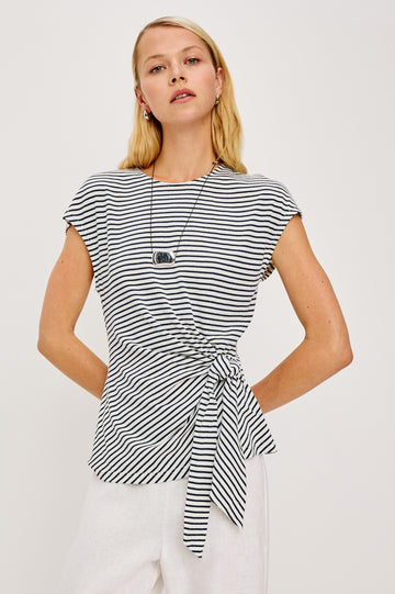 Gabbie Top in Cotton With Boat Neckline Dolman Cap Sleeves and Waist Wrap Ties in Ivory Navy Micro Stripe Colorway - Upper Body Front View Featured on Model
