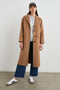 Gallery Below-the-Knee Coat with Three-Button Closure, Notched Lapels, and Two Front Flap Pockets in Camel Colorway - Front Full Body View Featured on Model
