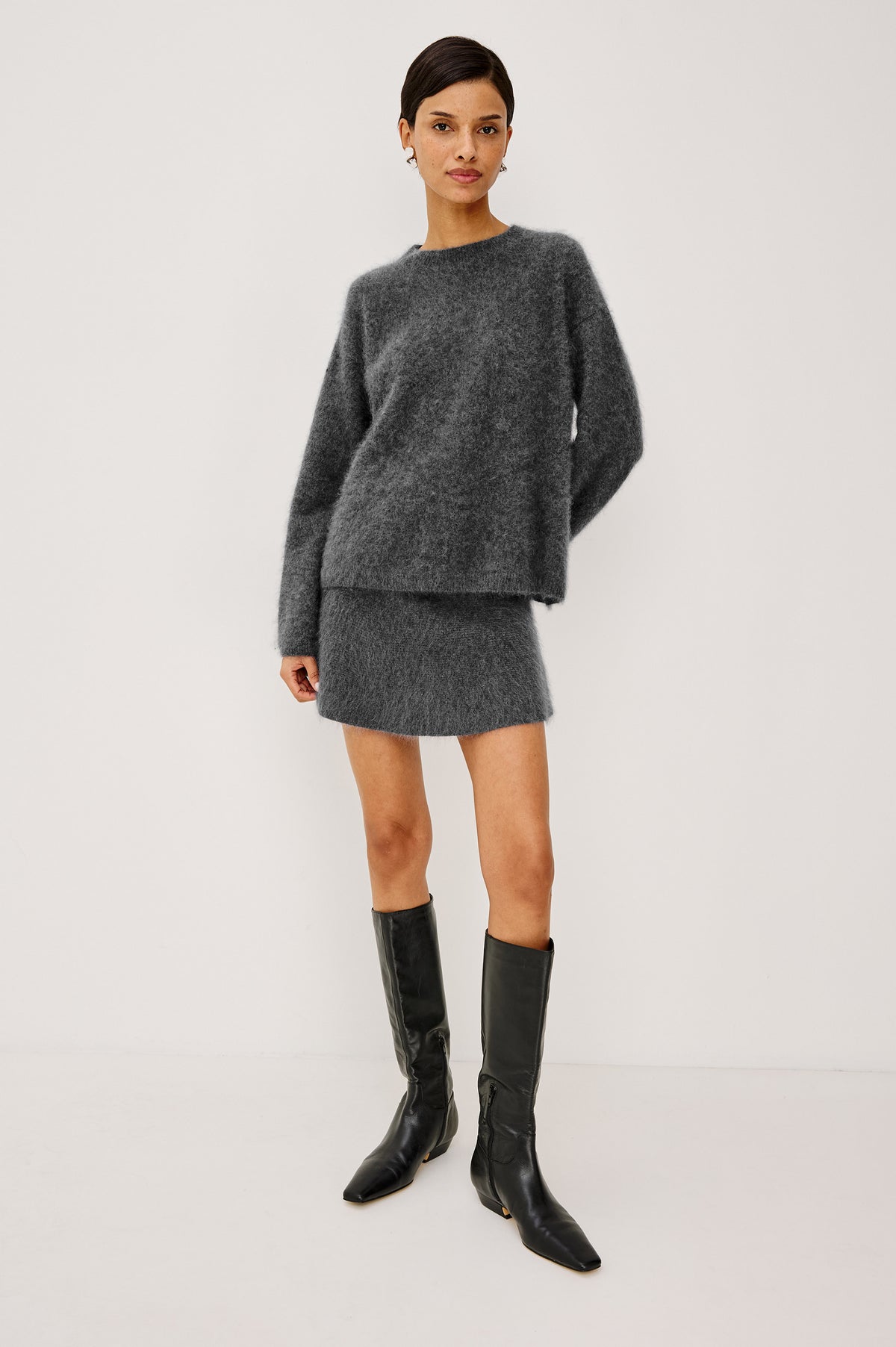 Gayle Mini Skirt in Brushed Wool With High Waist and A-Line Shape in Charcoal Colorway - Full Body Front View Featured on Model