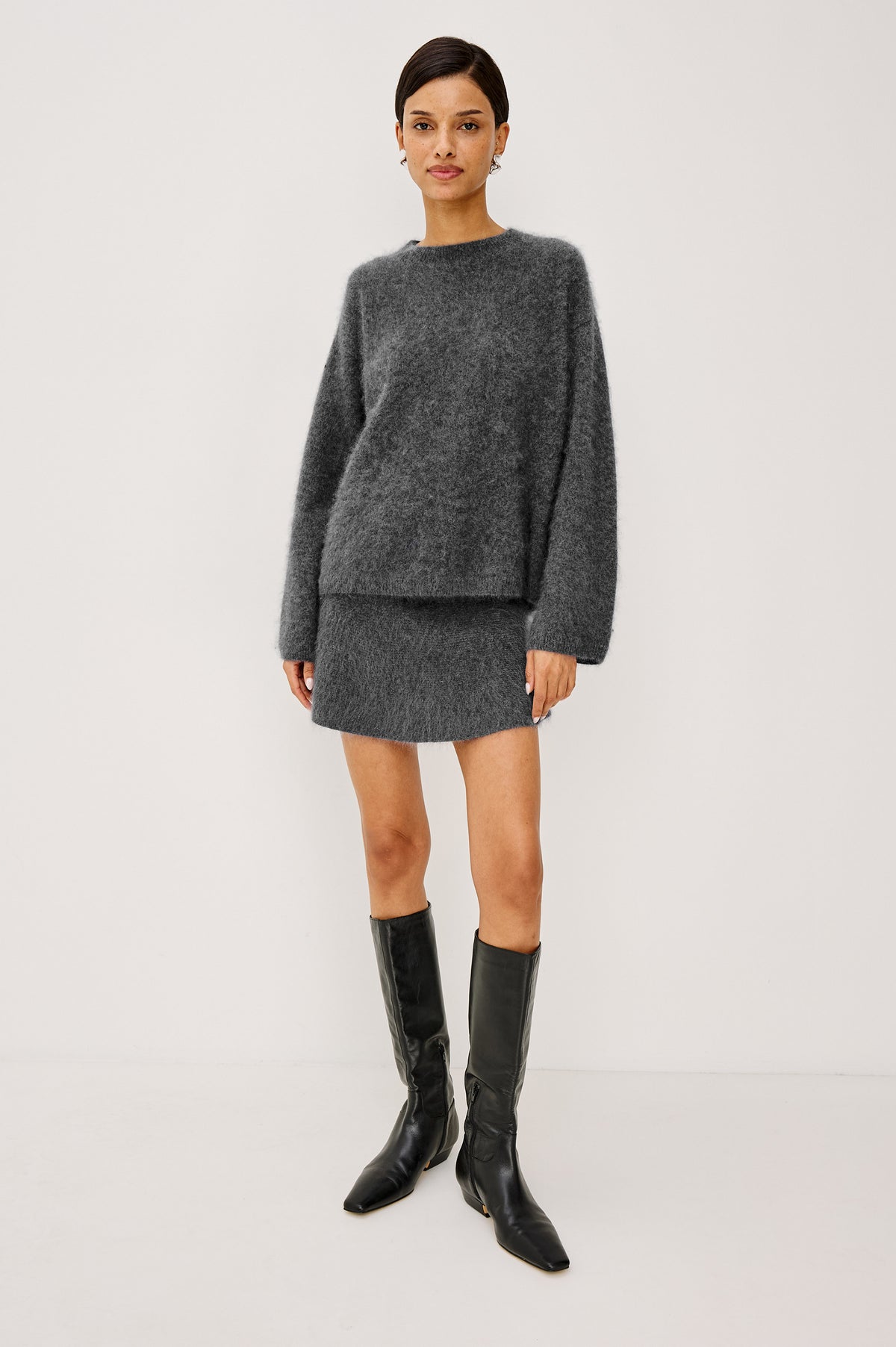 Gayle Mini Skirt in Brushed Wool With High Waist and A-Line Shape in Charcoal Colorway - Full Body Front View Featured on Model
