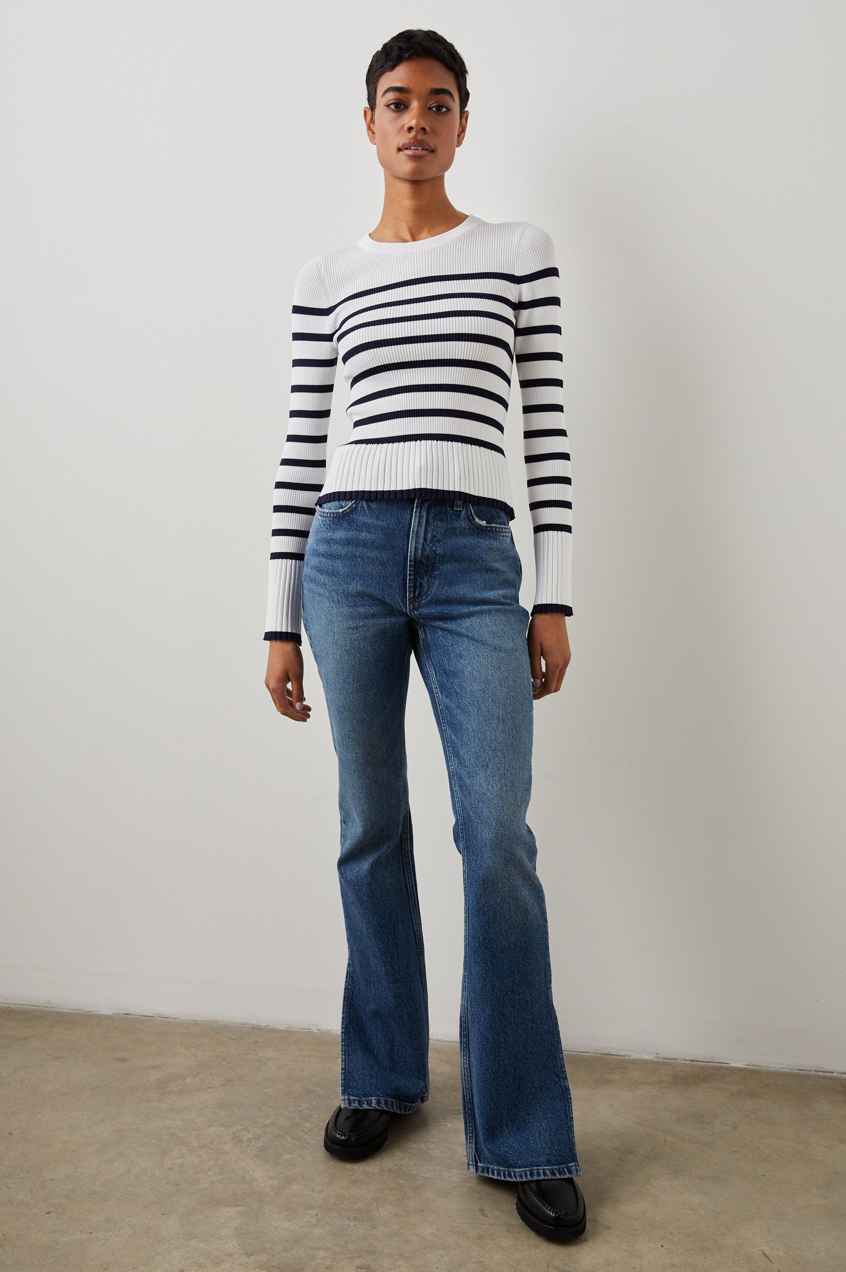 Gemma Ribbed Long-Sleeve Sweater with a Crew Neck in Ivory Navy Stripe Colorway, Horizontal Stripes - Front Full Body View Featured on Model 
