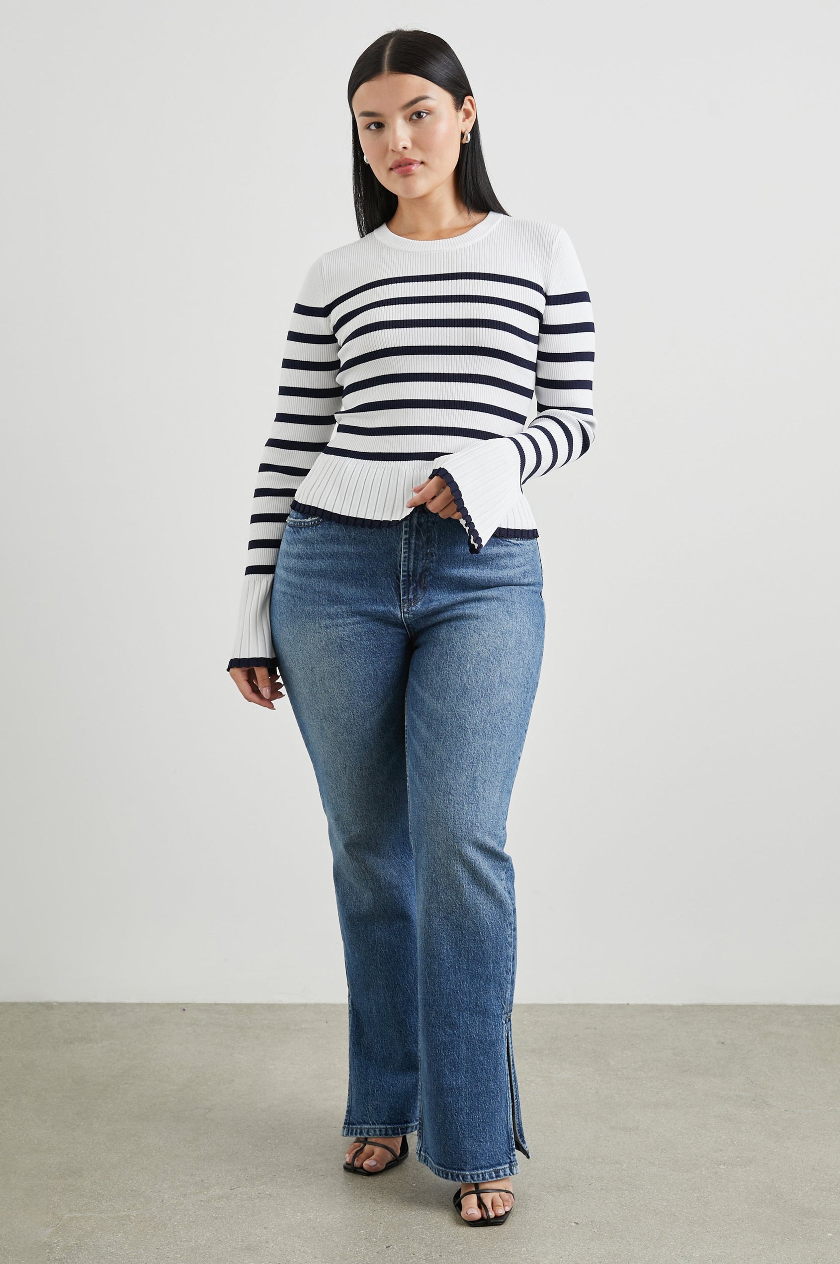 Gemma Ribbed Long-Sleeve Sweater with a Crew Neck in Ivory Navy Stripe Colorway, Horizontal Stripes - Front Full Body View Featured on Model 