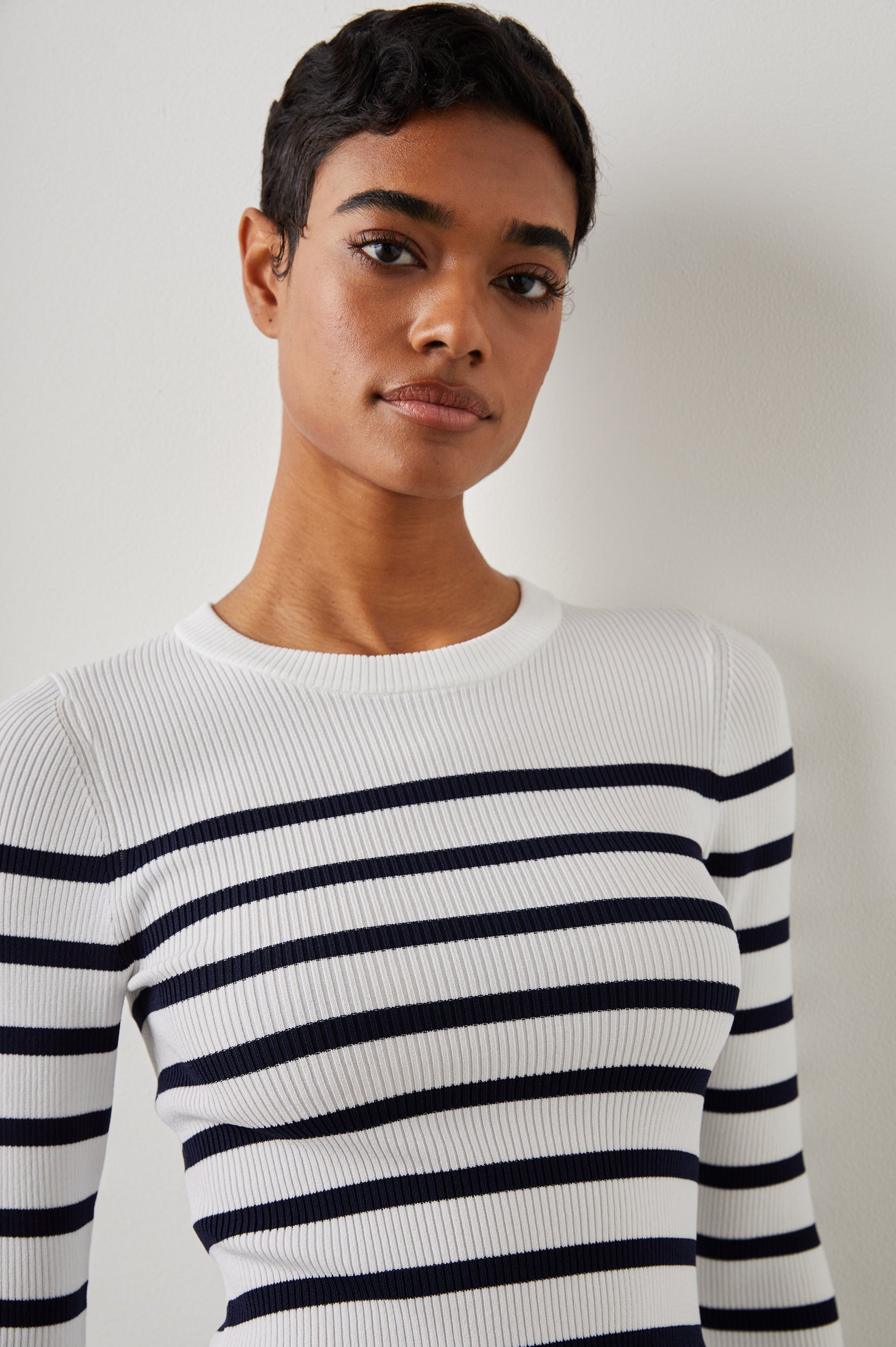 Gemma Ribbed Long-Sleeve Sweater with a Crew Neck in Ivory Navy Stripe Colorway, Horizontal Stripes - Front View Featured on Model 