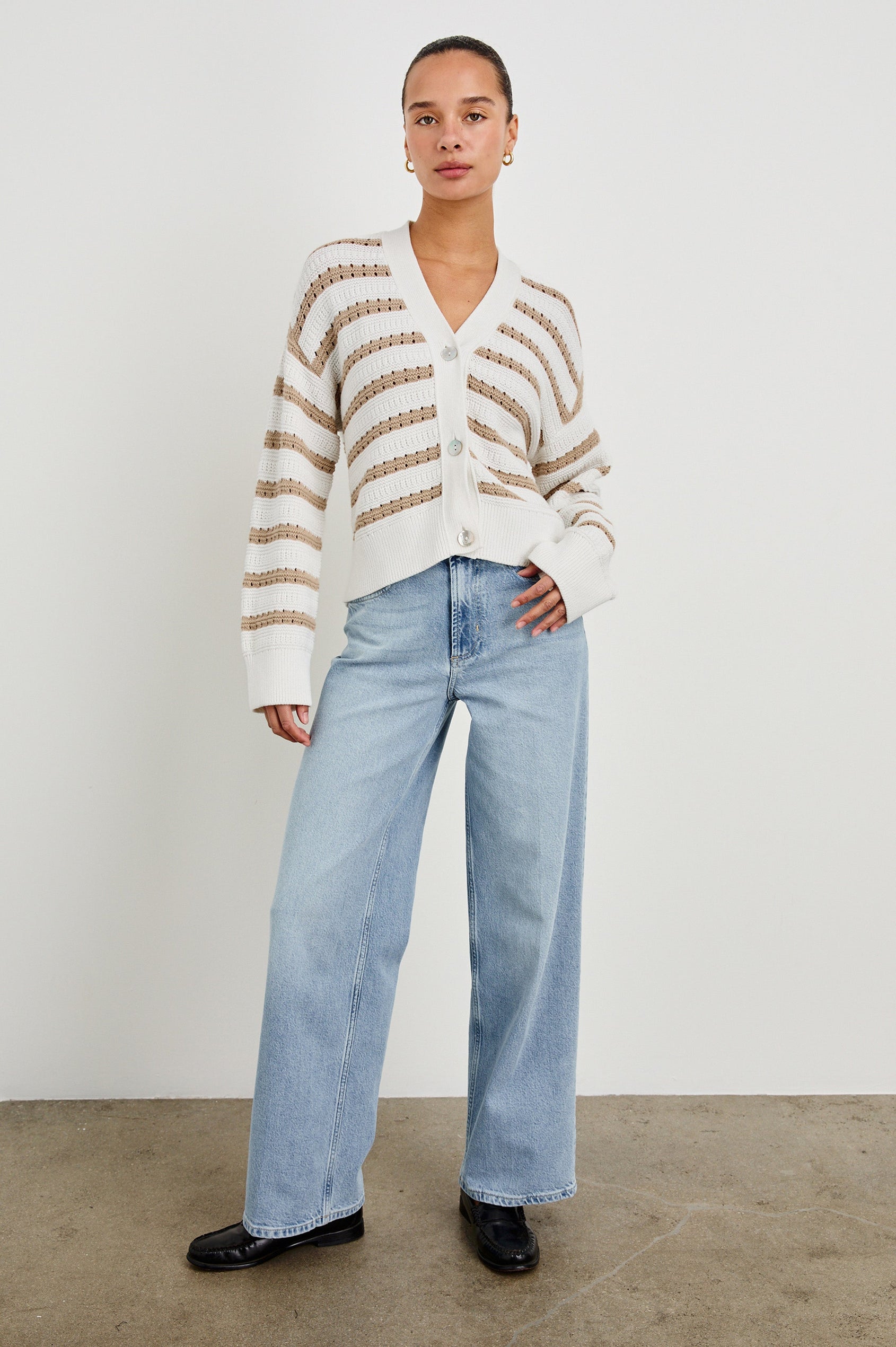 Geneva cropped cardigan sweater with front buttons and contrast trimmings in Ivory Oat Stripe -  full body front view on model