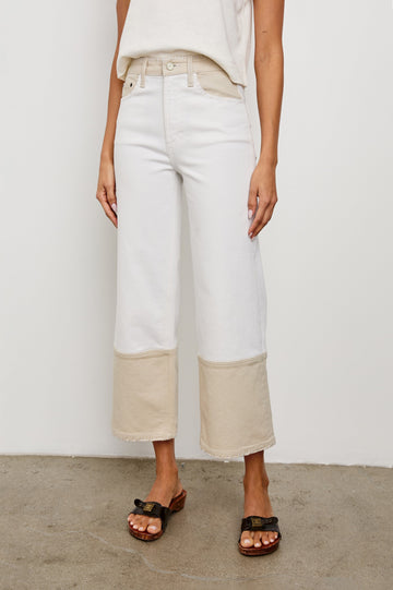 Getty cropped wide leg jean with blanket stiching and dual tones in Crema Embroidered - front view on model