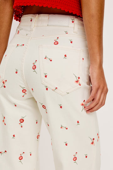 Getty cropped wide leg jean with Floral detailed embroidery in ecru colored denim - close up back view featured on model.