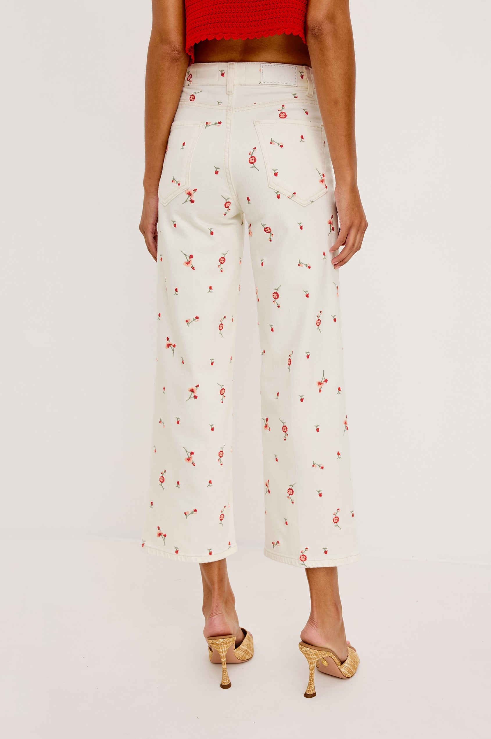 Getty cropped wide leg jean with Floral detailed embroidery in ecru colored denim - full body front view featured on model.