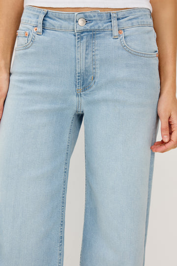 Getty Wide Leg Crop Jean in Light Stretch Denim With Wide Straight Legs, 27″ Inseam, 5-Pockets, and Front Button Fly in Low Rise Seaport Colorway - Lower Body Front Close Up View Featured on Model