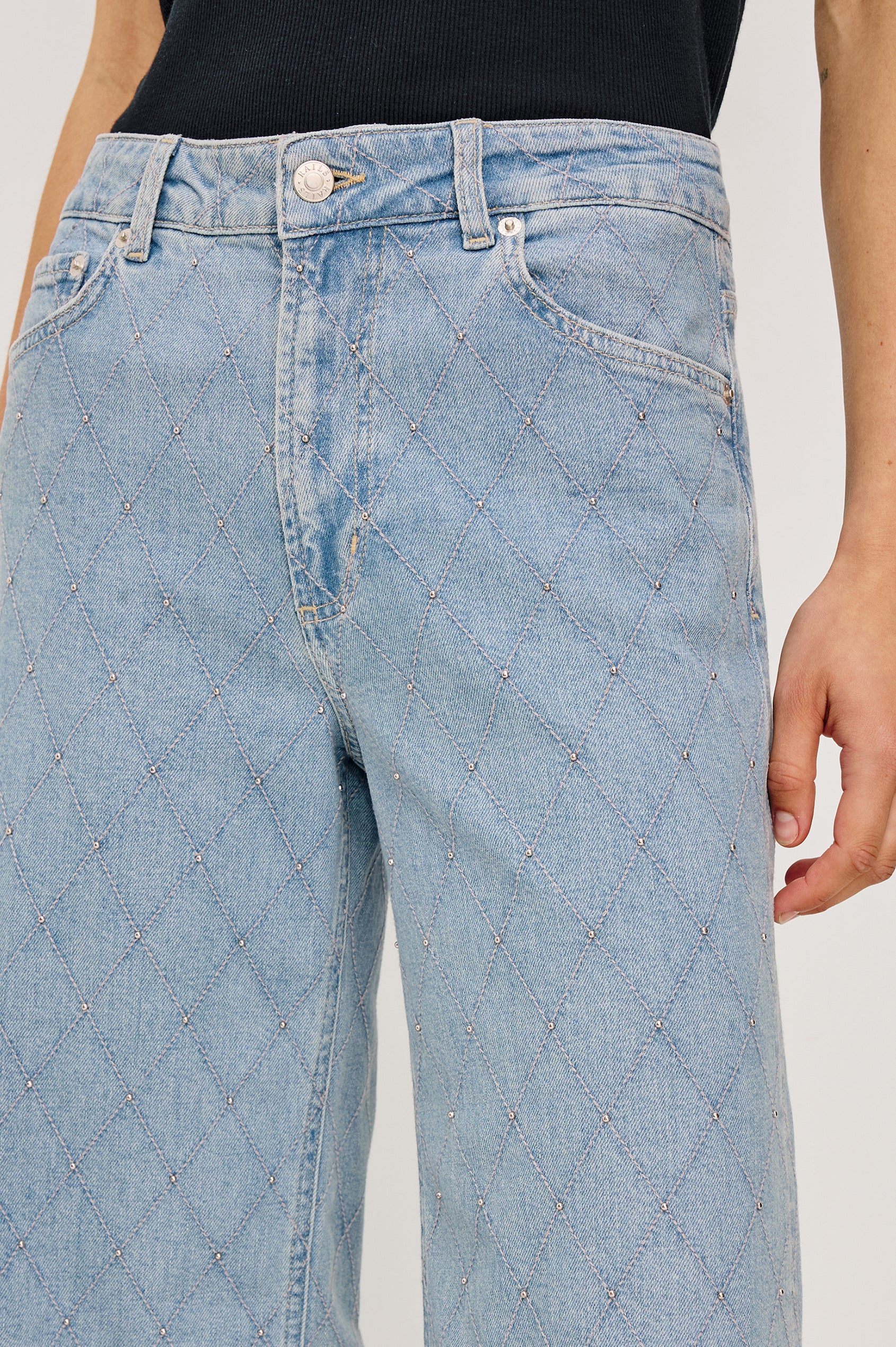 Getty Wide Leg Crop Jean in Light Stretch Denim With Wide Straight Legs, 27″ Inseam, 5-Pockets, and Front Button Fly in Quilted Stud Colorway - Lower Body Front View Featured on Model