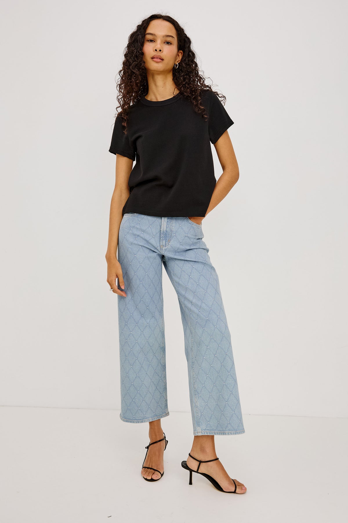 Getty Crop Wide Leg Jean in High-Stretch Denim With High-Rise, Wide Straight Leg Fit, 5-Pockets, and Zip Fly in Quilted Stud Colorway - Full Body Front View Featured on Model