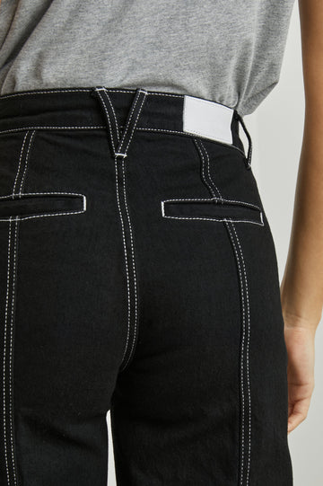 Getty Crop Utility Wide Leg Denim Pants with Belt Loops, Additional Seams, Two large Front Pockets and Two Back Patch Pockets in Orca Colorway, White Stitching along Seams - Back View Featured on Model