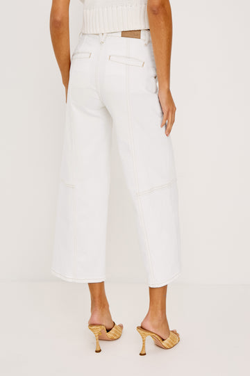 Getty Crop Utility Wide Leg Denim Pants with Belt Loops, Additional Seams, Two large Front Pockets and Two Back Patch Pockets in Vintage Ecru Contrast Stitch Colorway, gold-toned Seam Stitching - Back View Featured on Model