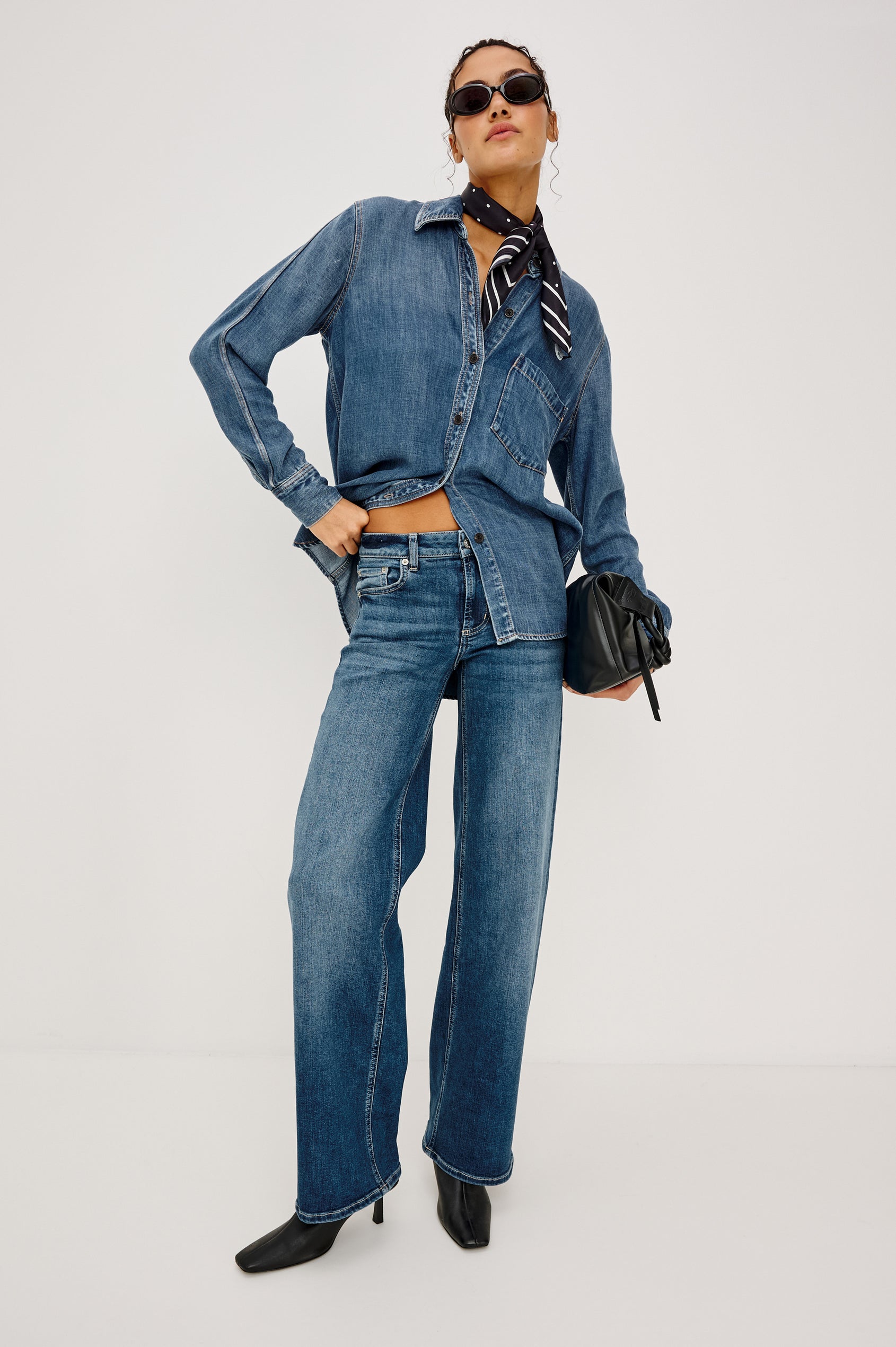 Getty Low Rise Wide Straight Leg Jean in HIgh Stretch Denim With 5-Pockets, Zip Fly, and 31″ Inseam in Lagoon Colorway - Full Body Front View Featured on Model