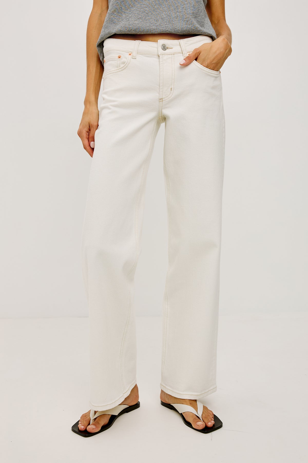 Getty Low Rise Wide Leg Jean in Comfort-stretch Denim With 5-Pockets in Vintage Ecru Colorway - Lower Body Front View Featured on Model