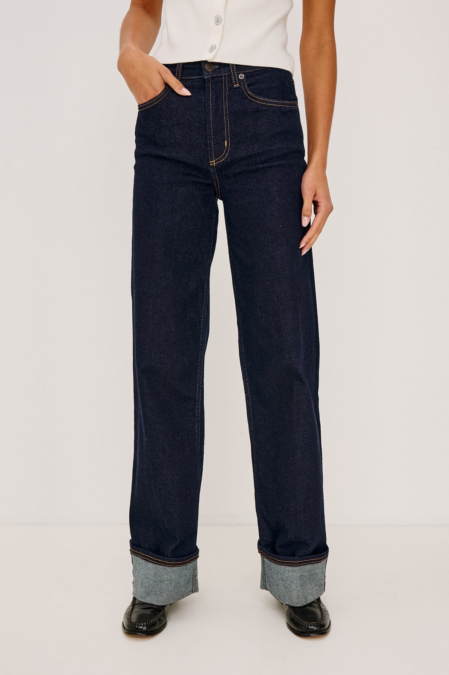 Getty Wide Leg Jean in Light Stretch Denim With High-Rise High-Waisted Fit, Button Fly, and 5-Pockets in Midnight Blues Cuffed Colorway - Lower Body Front View Featured on Model