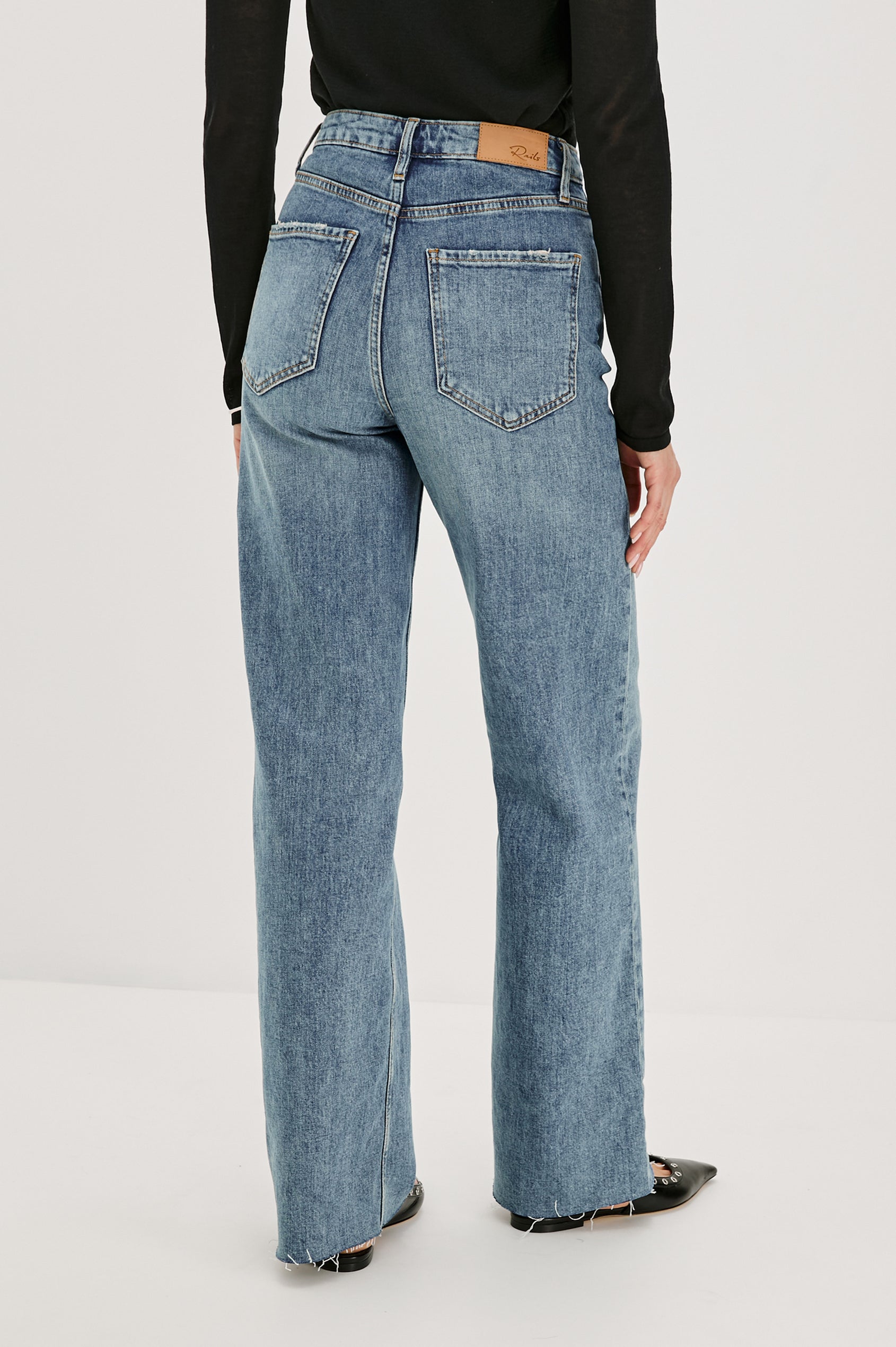 Getty full length 5-pocket wide leg jean in Tradewind colorway, a medium wash. Back view featured on model.