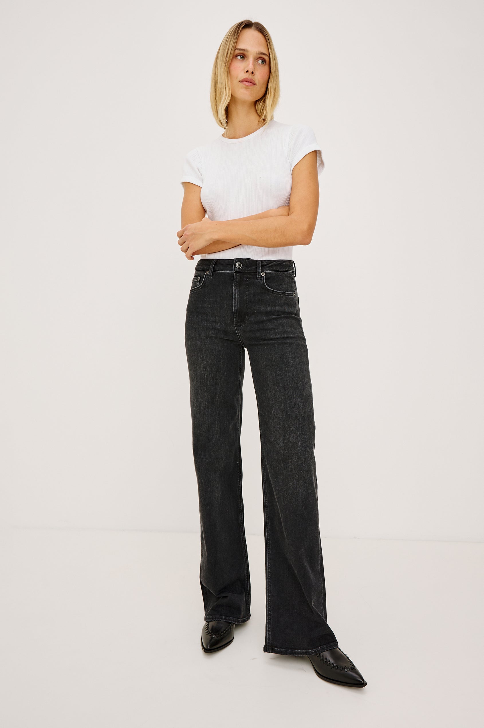 Getty Wide Leg Jean in Light Stretch Denim With 5-Pockets in Vintage Black Colorway - Full Body Front View Featured on Model