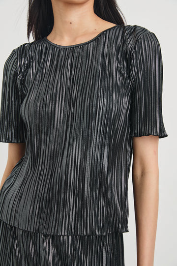 Goldie Short Sleeve Top with a Crew Neck in Gunmetal Colorway, with Thin Vertical Stripes of Back, White and Greys - Front View Featured on Model