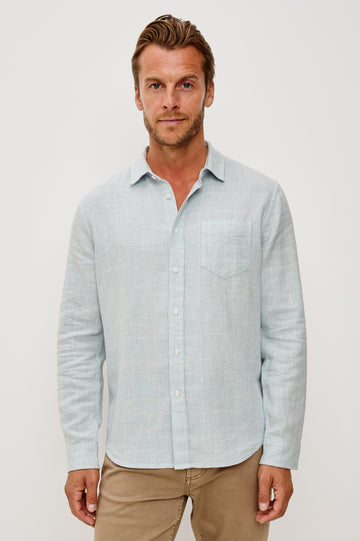 Gracy Button-Up Shirt With Long Sleeves, Collar, and Single Patch Pocket in Bulgur Cream Colorway - Upper Body Front View Featured on Model