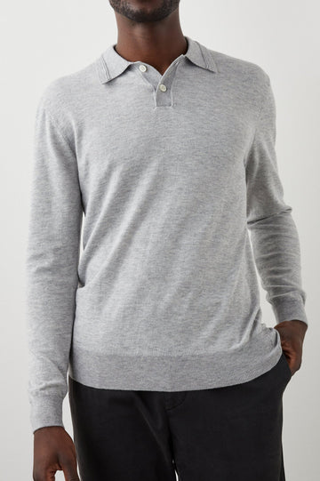 GREENWICH HEATHER GREY CREAM SWEATER - FRONT ONE HAND IN POCKET