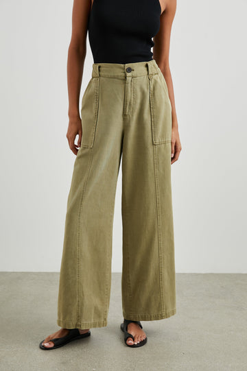 Greer Pants with Two Large Front Pockets, Two Back Welt Pockets and Vertical Seams Down the Front and Back Legs in Canteen Colorway - Front View Featured on Model 