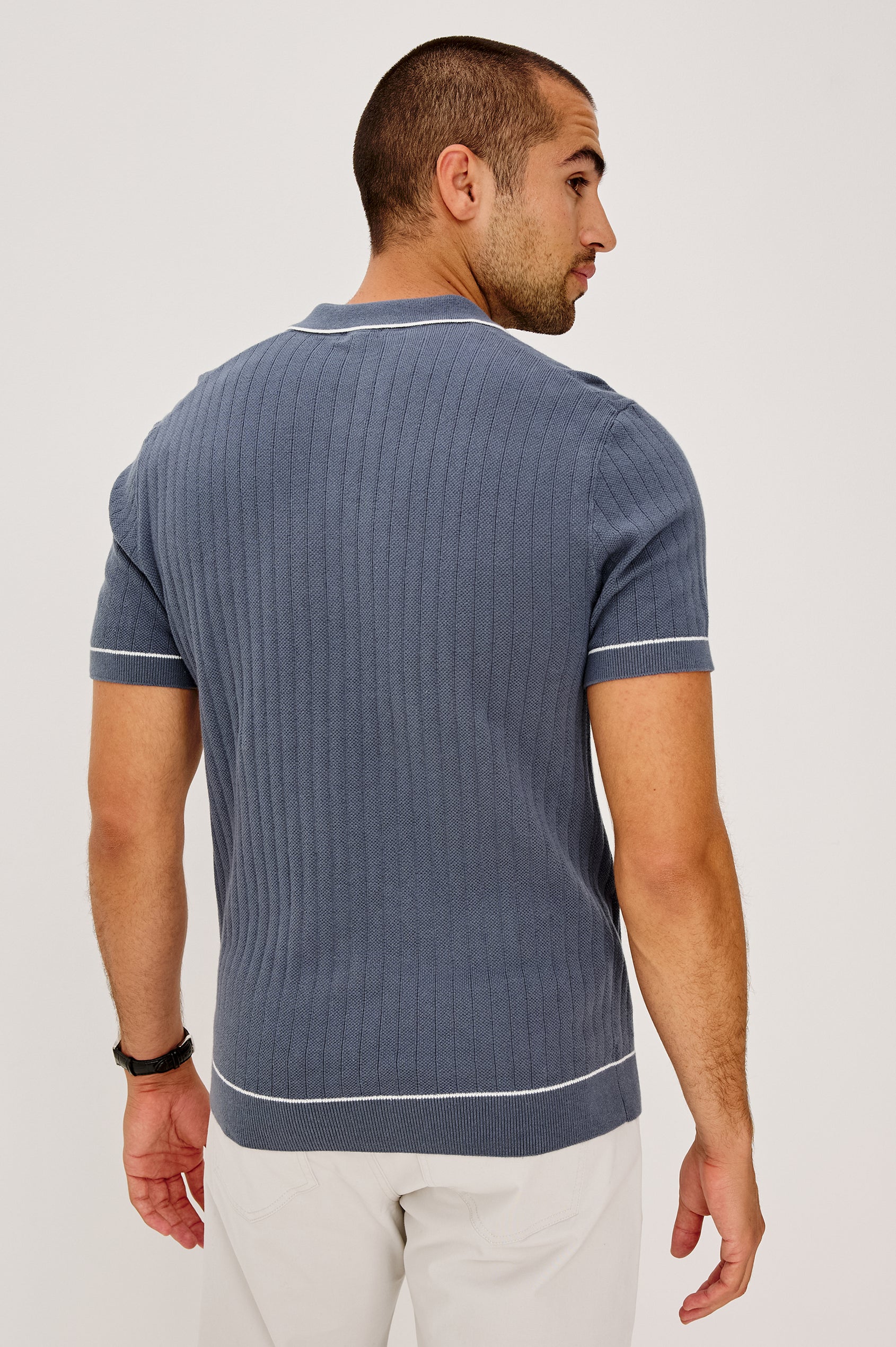 Hardy Polo Shirt in Luxe Cotton Rib Knit With Collar, Half Button Placket, Short Sleeves, and Contrast Trim in Faded Navy Colorway - Full Body Front View Featured on Model