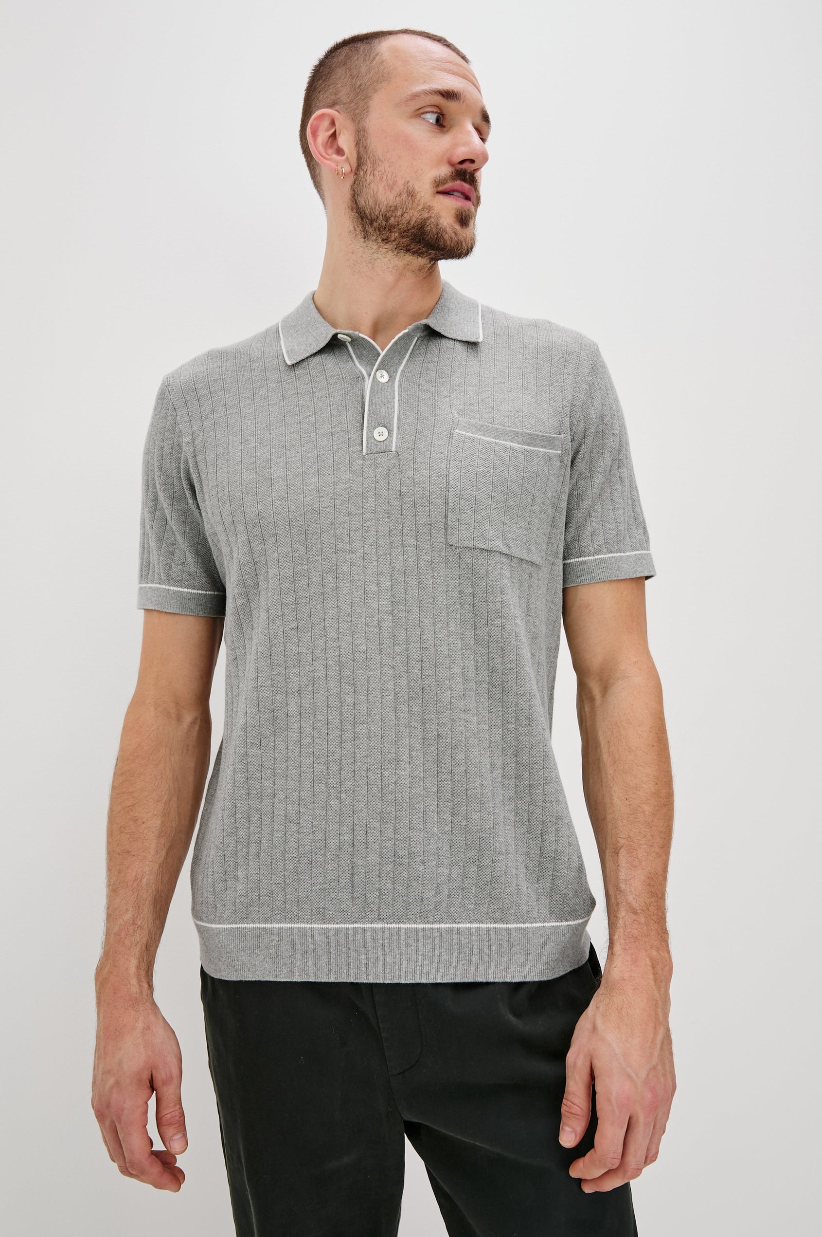Hardy short sleeve cotton rib polo with chest pocket, two button placket and contrast stitching in Grey Melange - front view on model