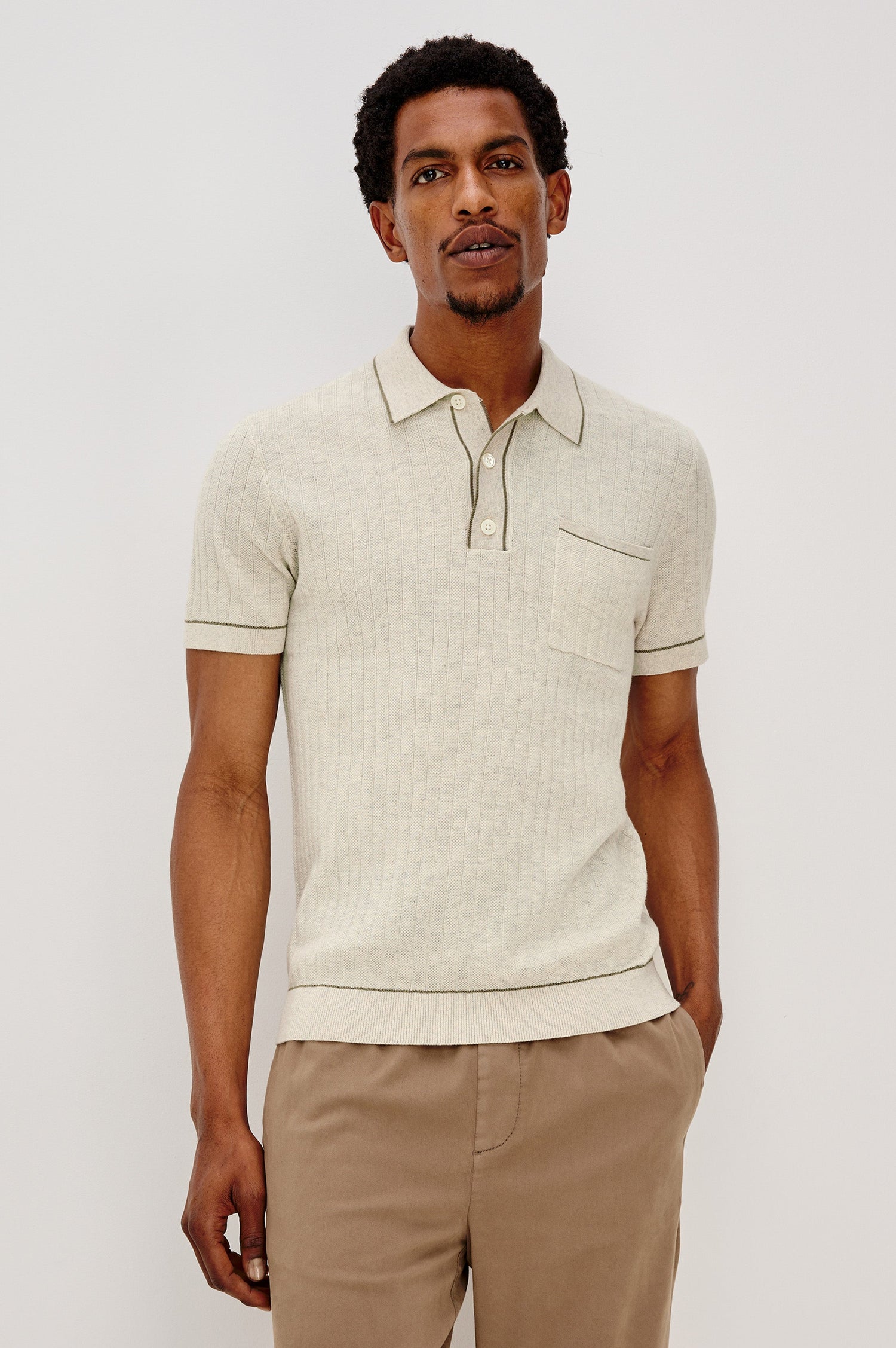 Hardy short sleeve cotton rib polo with chest pocket, two button placket and contrast stitching in Oat Heather - front view on model