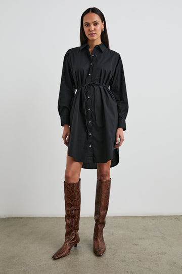 Harmony Long-Sleeve Mini Dress with Buttons Down the Front, Buttoned Cuffs, a Collar, Side Slits and a Tie at the Waist in Black Colorway - Front Full Body View Featured on Model
