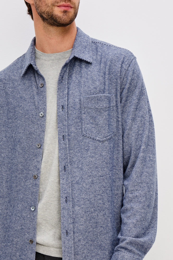 Hawke Long Sleeve Button Front Shirt with a Chest Pocket in Marine Twill Colorway. Front Detailed View Featured on Model.