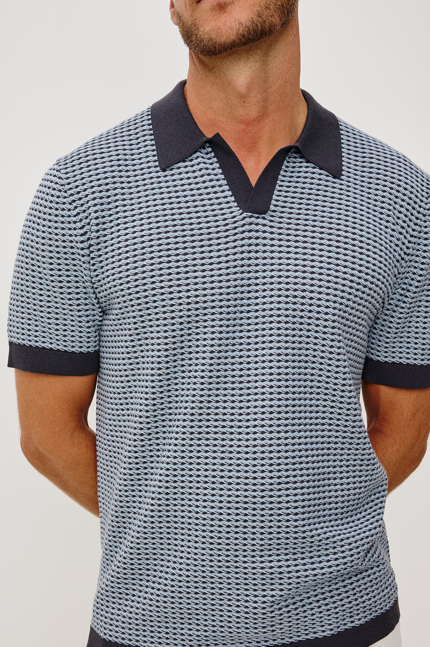 Hayden Polo Shirt in Lightweight Cotton With Split V-Neck Collar, Short Sleeves, and Classic Fit in Blue Lagoon Ripple Colorway - Upper Body Close Up Front View Featured on Model