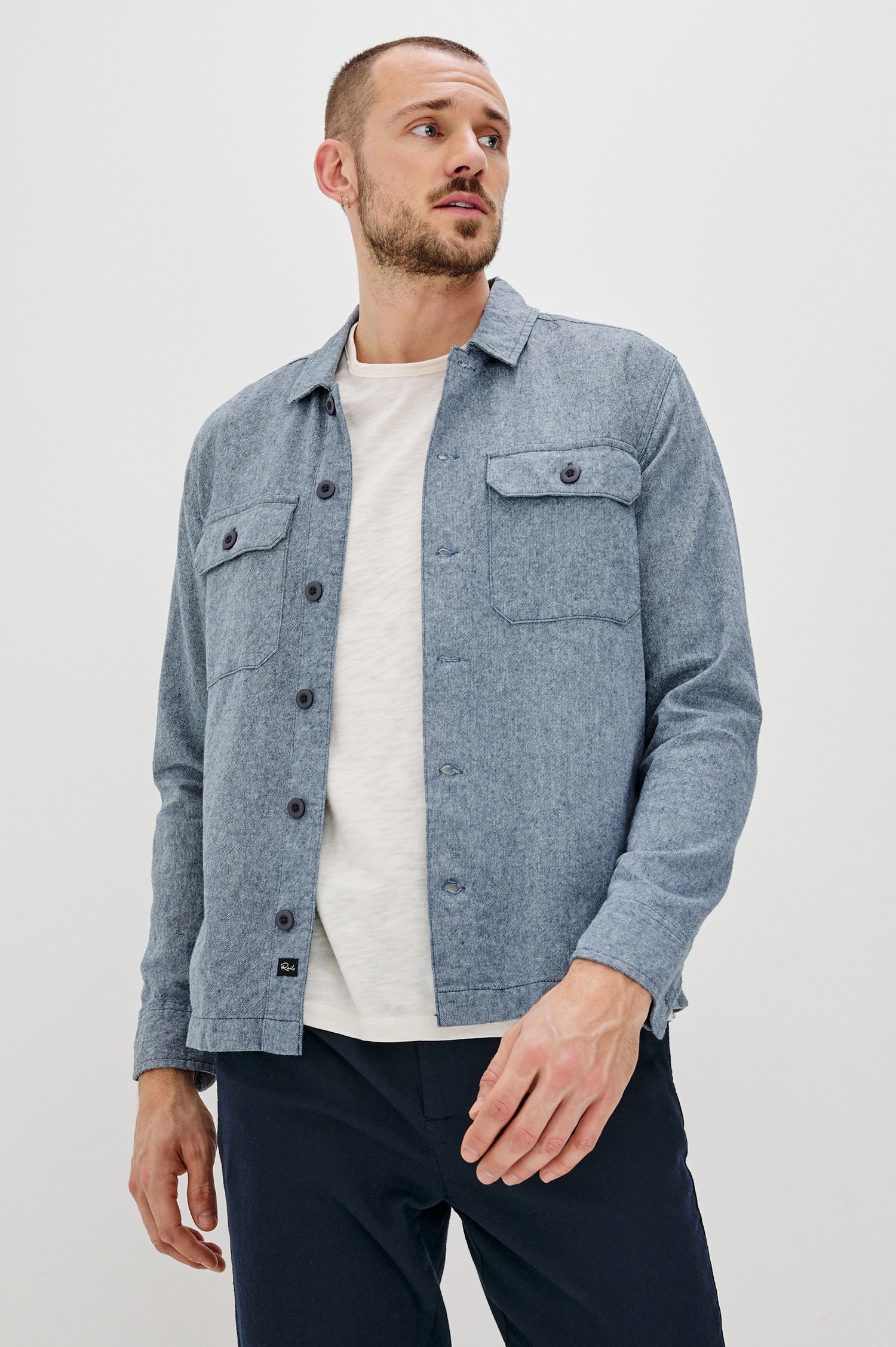 Hayes Shirt Jacket with Long Sleeves and Chest Flap Pockets with Button Closure, Exposed Button Front in Blue Mirage. Front View Shown on Model.