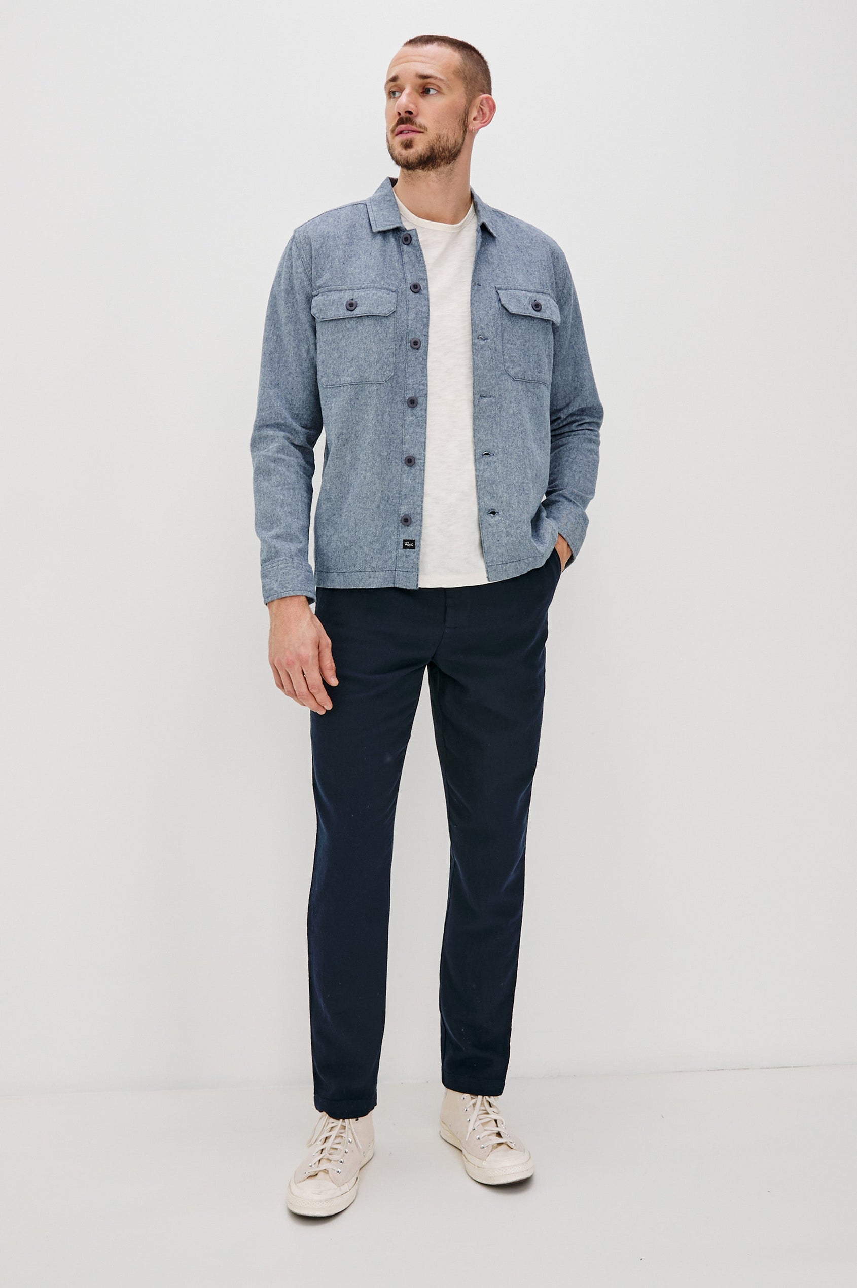 Hayes Shirt Jacket with Long Sleeves and Chest Flap Pockets with Button Closure, Exposed Button Front in Blue Mirage. Full Body Front View Shown on Model.