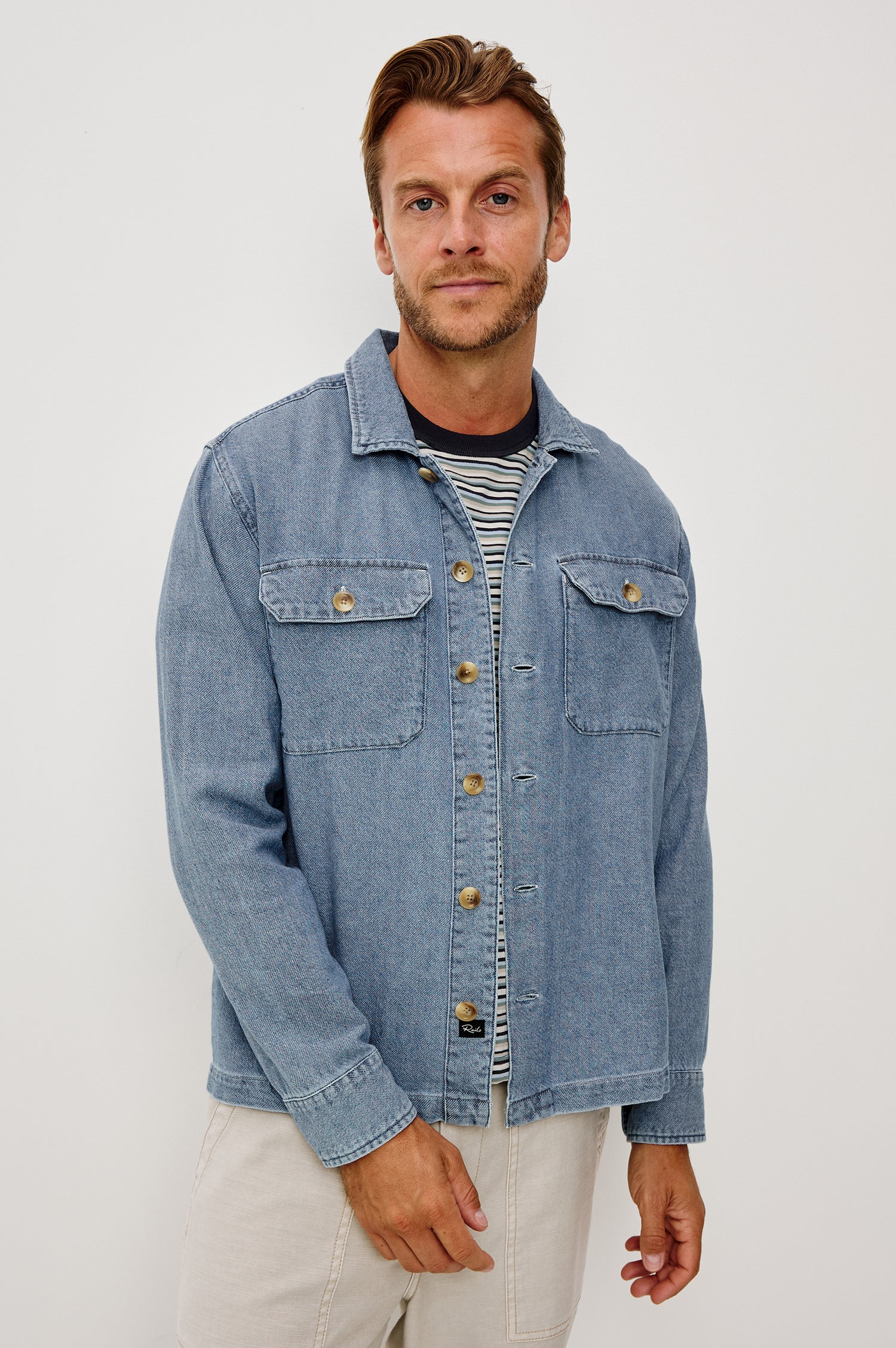 Hayes Shirt Jacket in Linen Cotton Slub With Long Sleeves, Chest Patch Pockets, and Collar in Medium Wash Indigo Colorway - Upper Body Front View Featured on Model