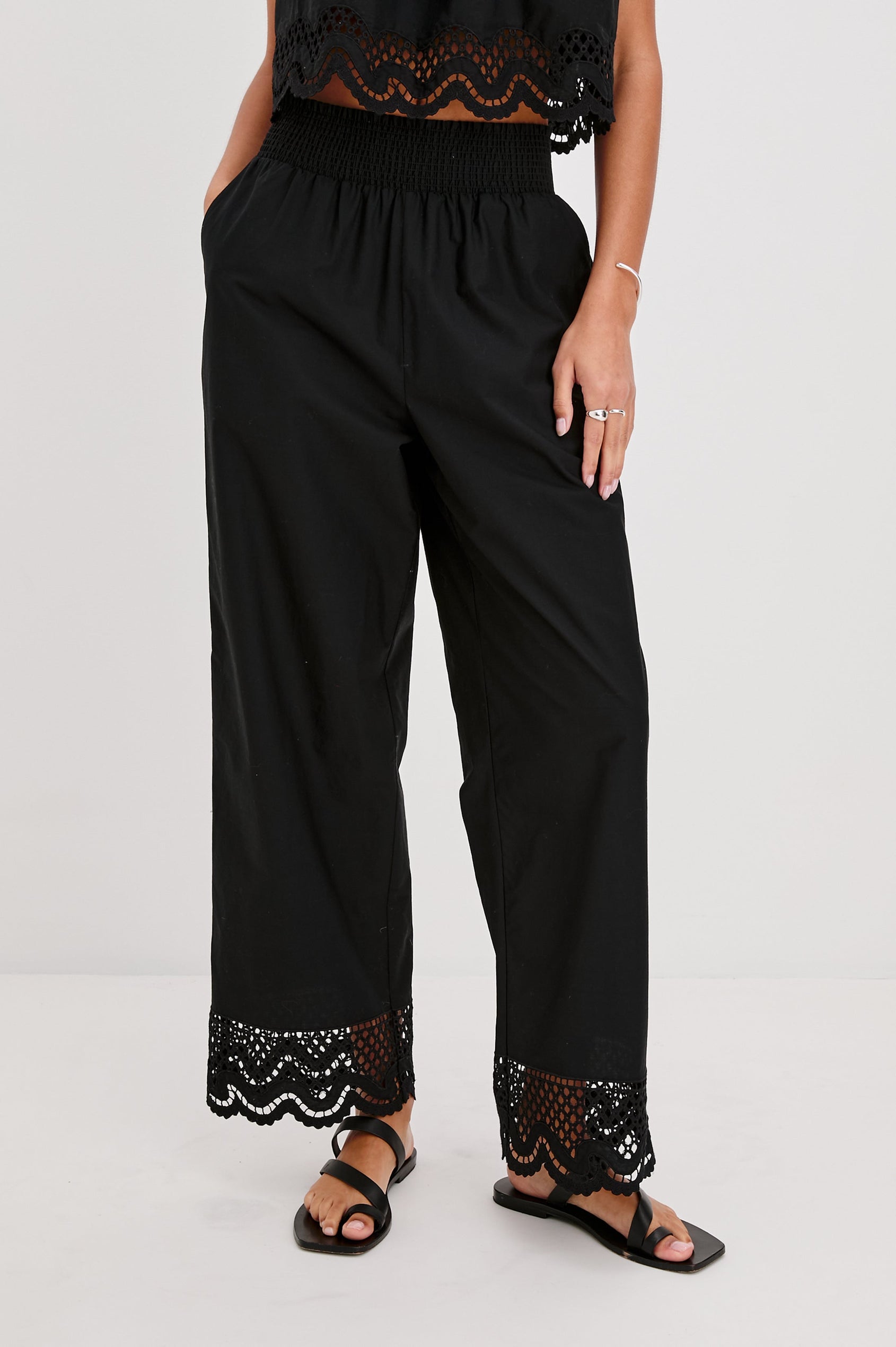 Henrik High Waist Pull on Pant with Smocked Elastic Waistband, Scalloped Embroidered Hem and Front Slash Pockets. Front View Shown on Model.