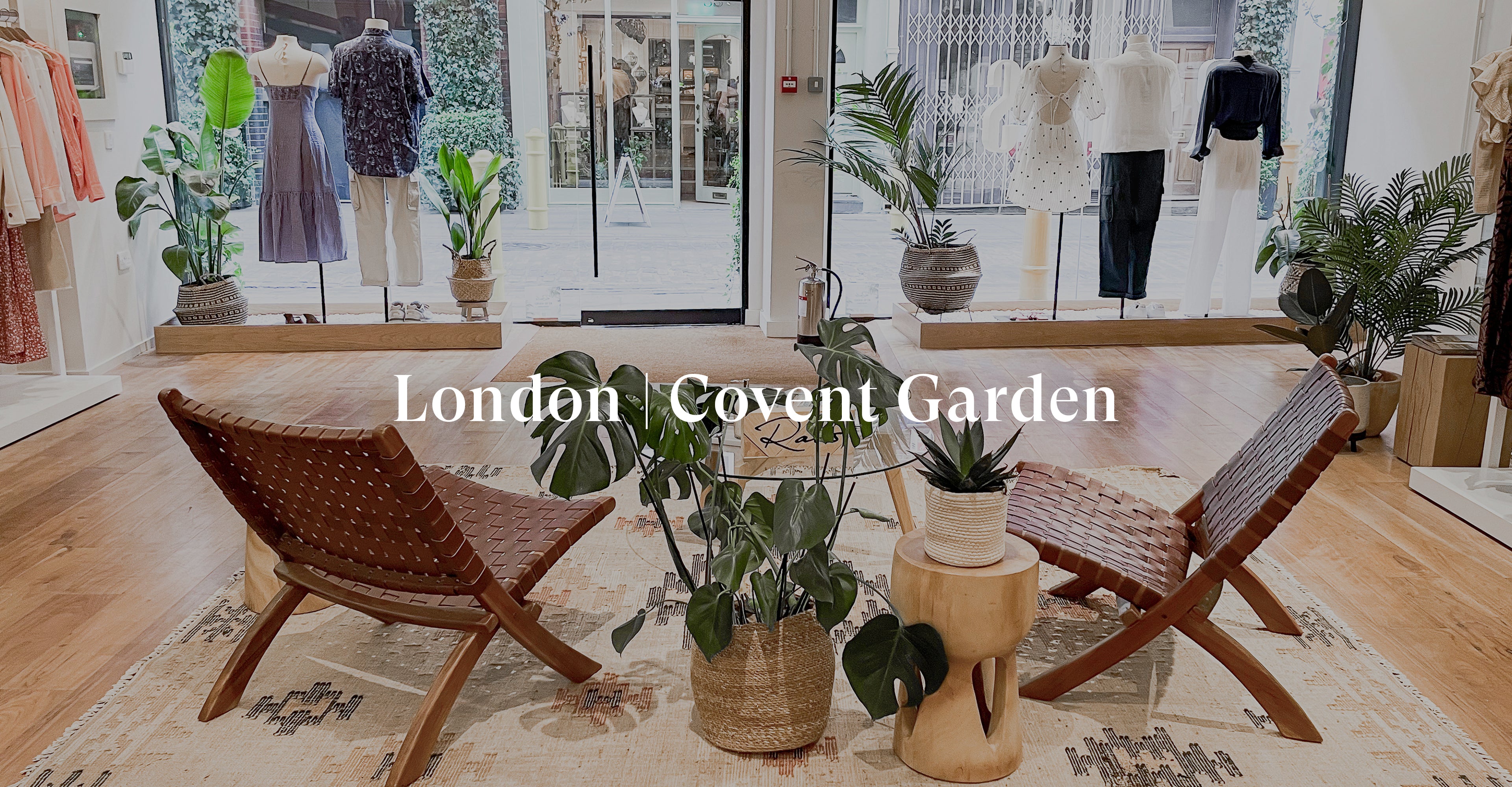INSIDE OF LONDON COVENT GARDEN STORE SHOWING TWO CHAIRS IN THE CENTER OF THE ROOM