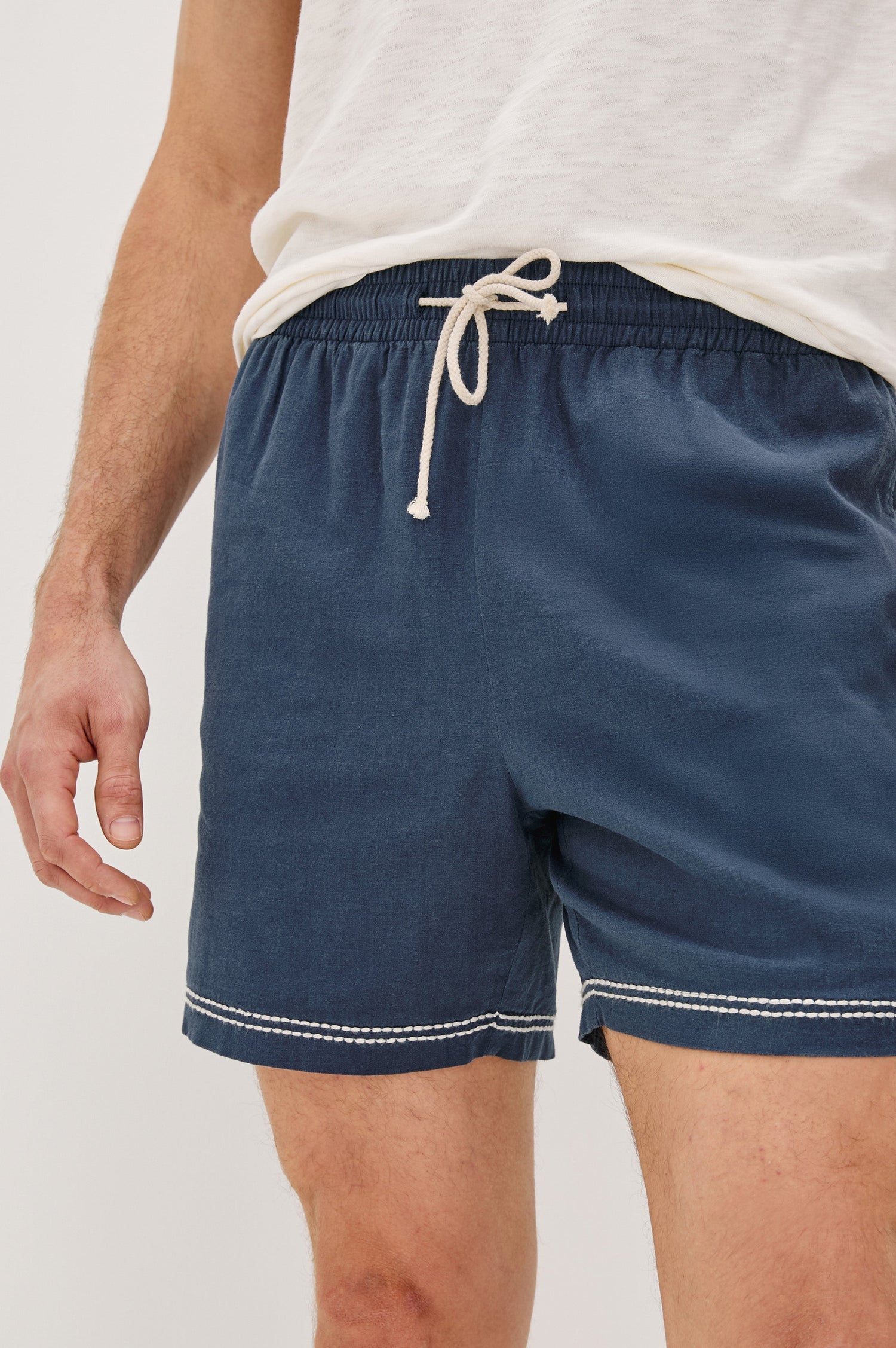 Hudson Elastic Waist Short with a Drawstring Waist, Contrast White Stitching and Side Pockets. Front Detail View Shown on Model.