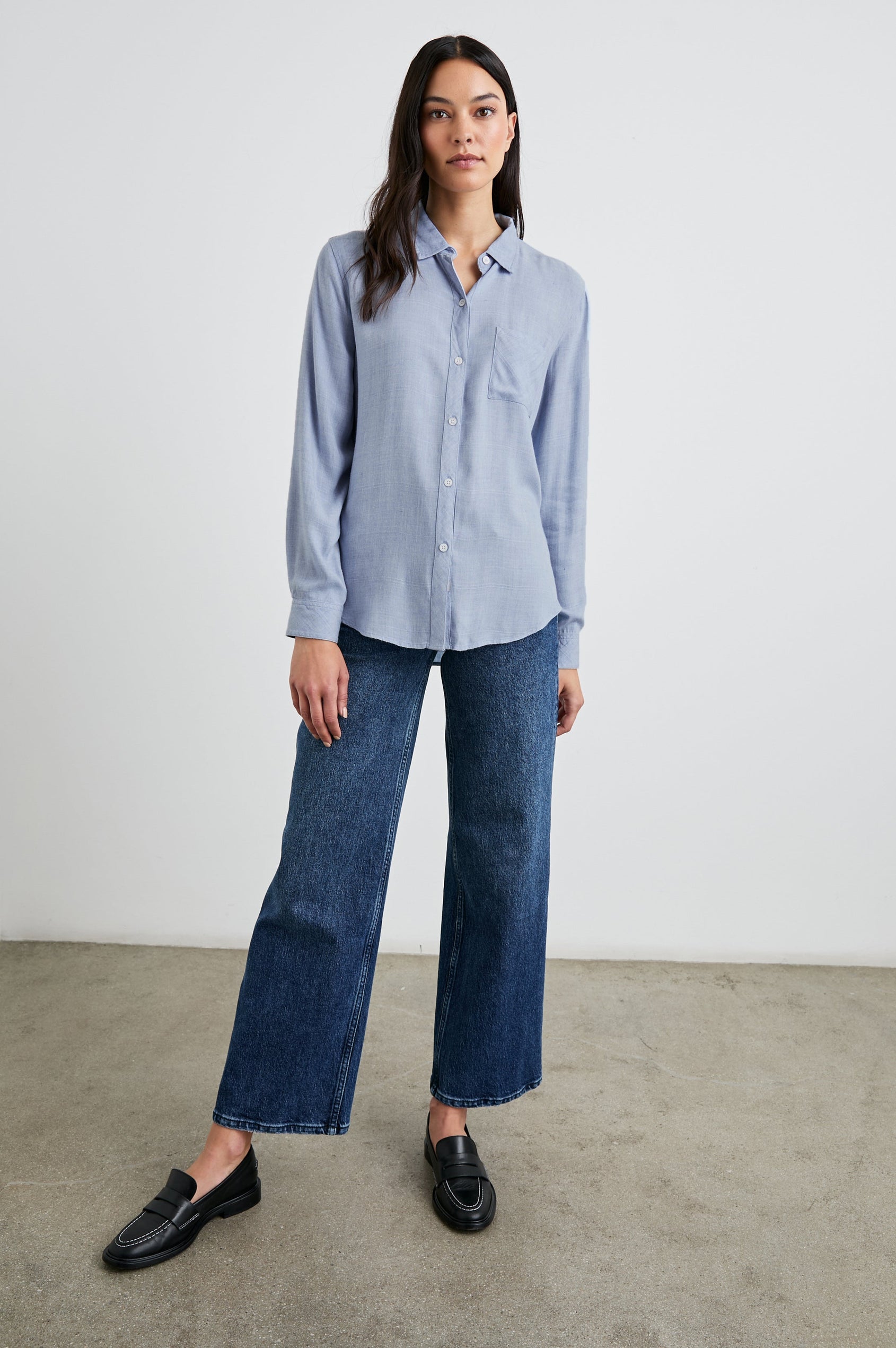 Hunter Long-Sleeve Button Up with a Chest Patch Pocket in Chambray Heather Colorway - Front Full Body View Featured on Model