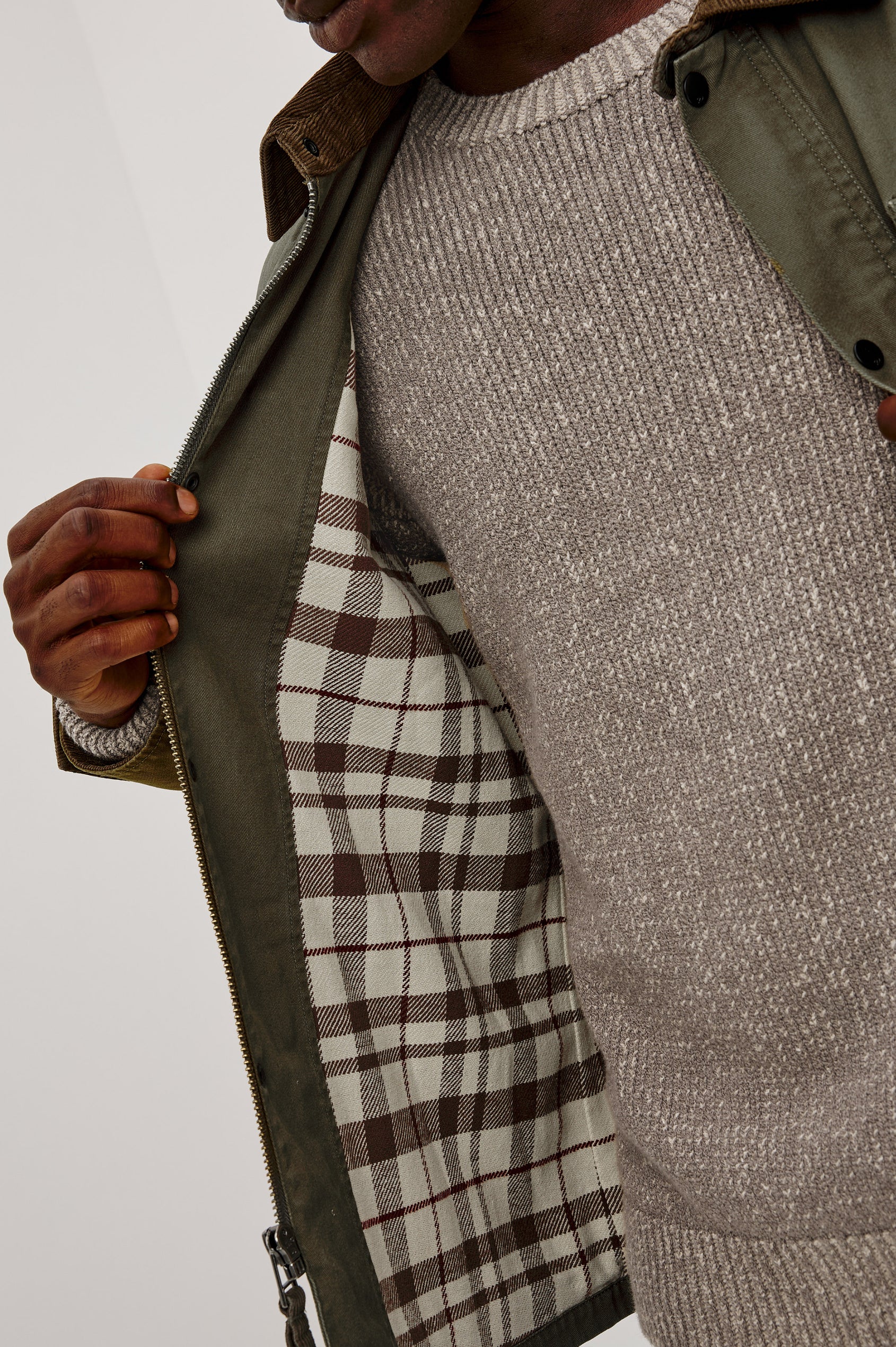 Huntly Jacket in Twill With Plaid Lining, Corduroy Collar, Storm Flap Snap-and-Zip, Four Front Snap Flap Pockets, and Long Sleeves in Highland Colorway - Upper Body Close Up View Featured on Model