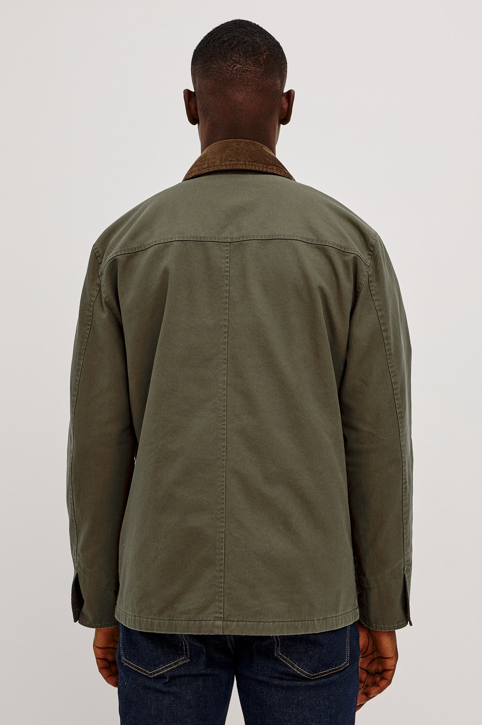 Huntly Jacket in Twill With Plaid Lining, Corduroy Collar, Storm Flap Snap-and-Zip, Four Front Snap Flap Pockets, and Long Sleeves in Highland Colorway - Upper Body Back View Featured on Model