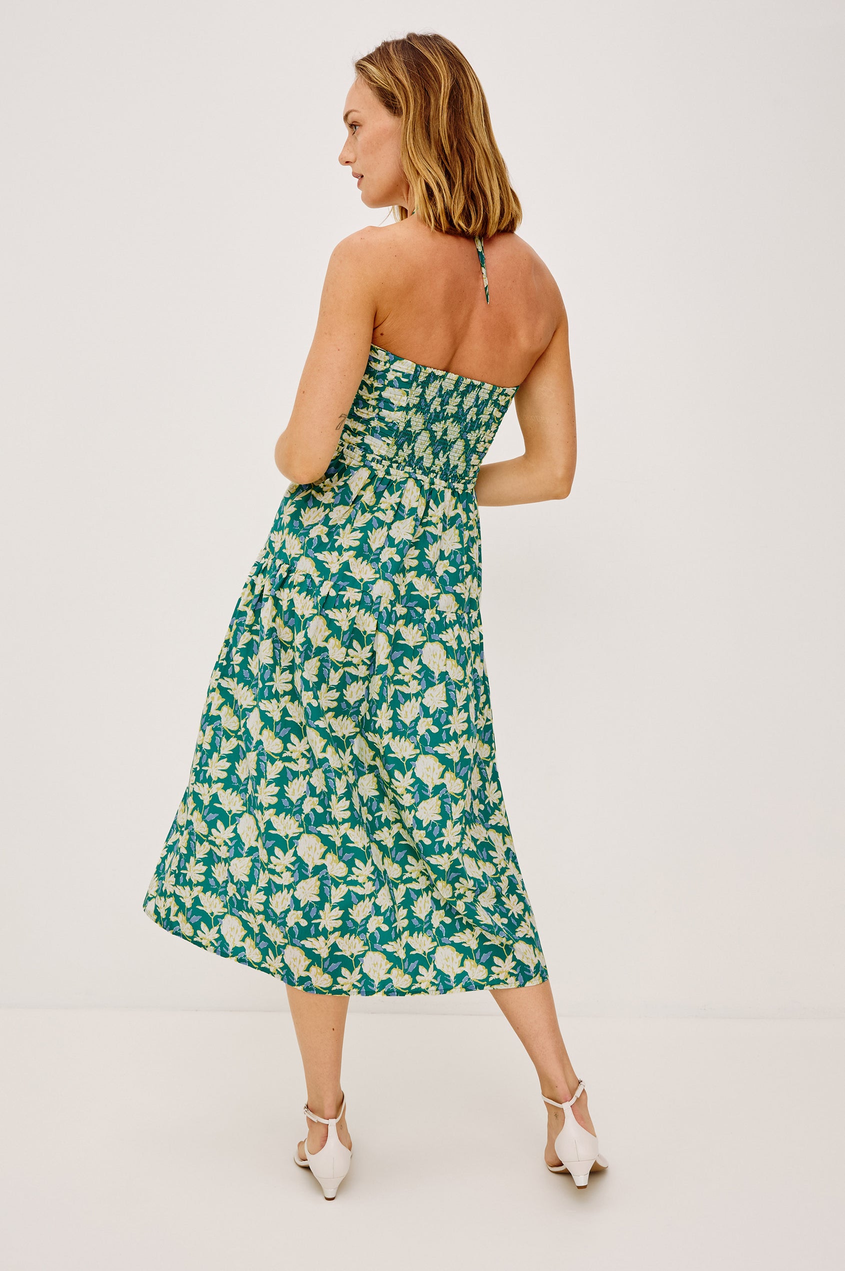 Irene Midi Dress in Cotton Poplin With Ruched Semi-Sheer Keyhole Bodice, Adjustable Halter Ties, Back Smocking, Side Zip, and Fully Lined in Green Mayflower - Full Body Back View Featured on Model