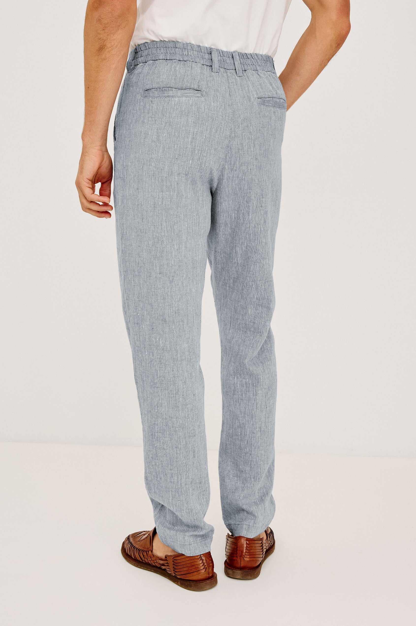 Irving Pant in Cotton-Linen Blend With Slim Straight Legs, Side Slant Pockets, and Back Welt Pockets in Bicoastal Blue Colorway - Lower Body Back View Featured on Model