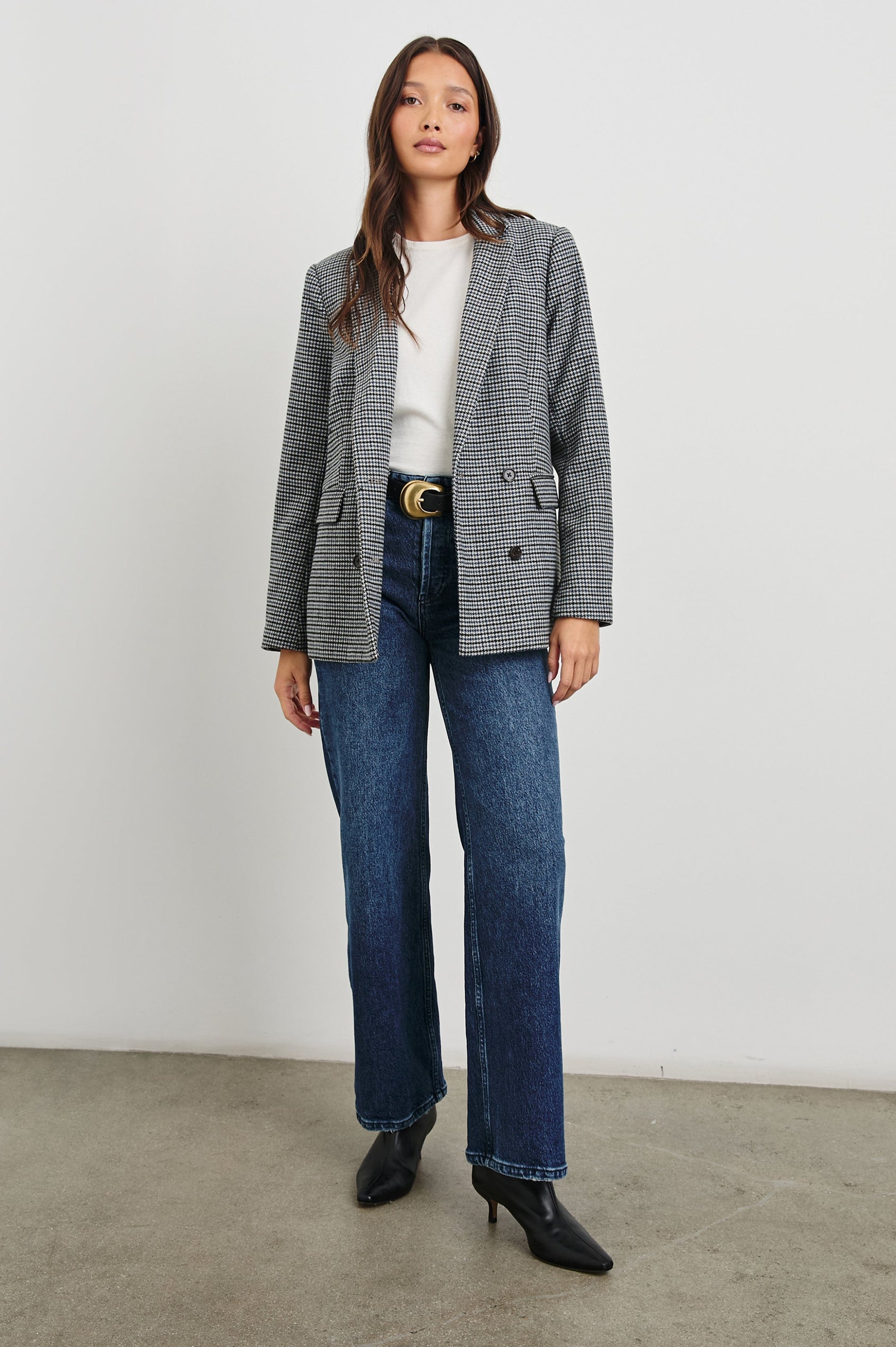 Jac Double-Breasted Blazer with Two Front Flap Pockets and a Notched Label in Black Lapiz Colorway, Houndstooth with black, blue, brown and cream - Front Full Body View Featured on Model