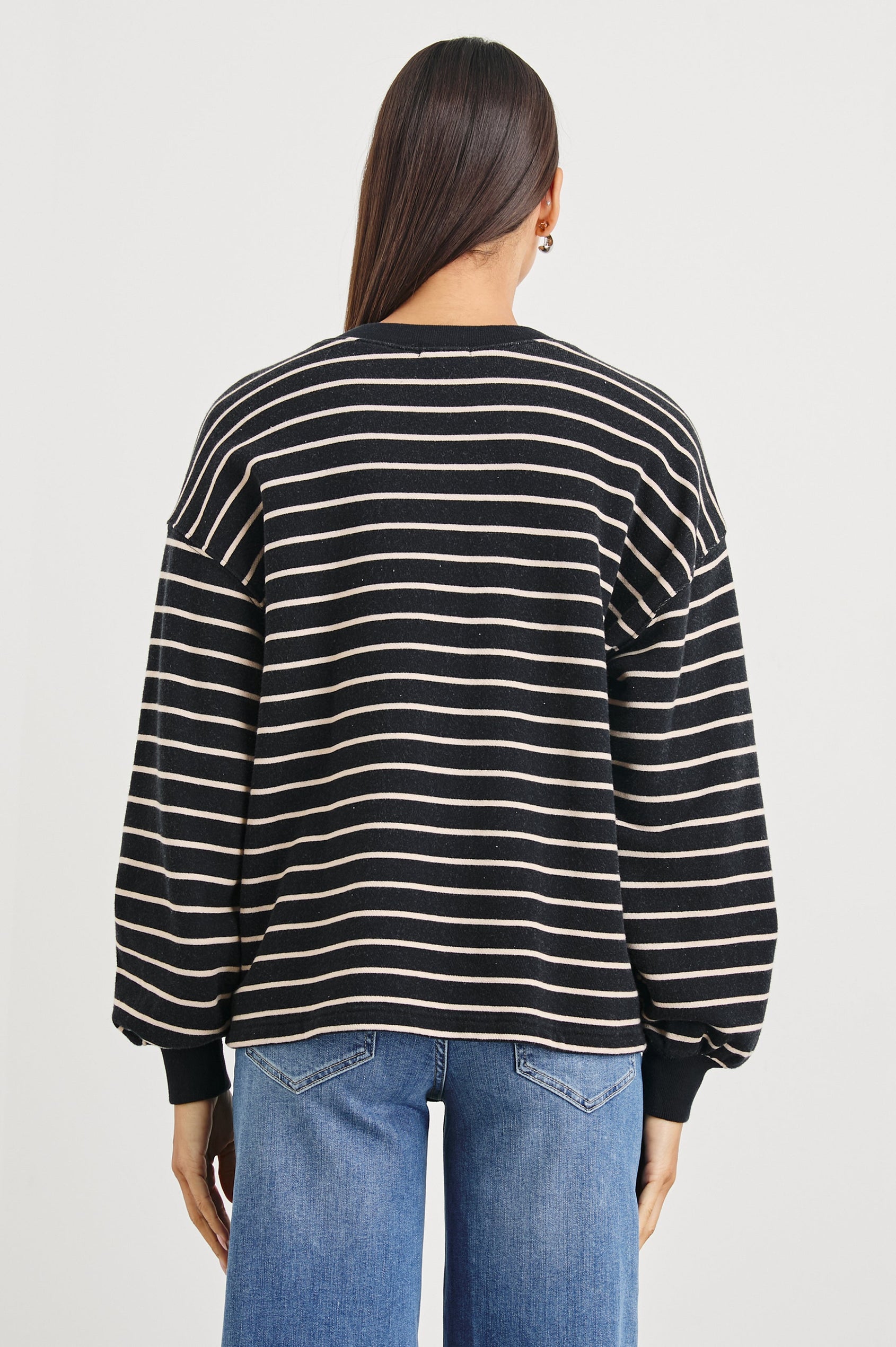 Joan Long-Sleeve Sweatshirt with Buttons to the Mid-Torso and Cuffed sleeves in Black Ivory Stripe Colorway, horizontal stripes - Back View Featured on Model