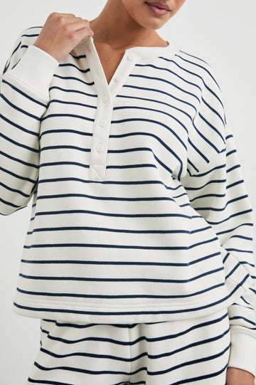 Joan Long-Sleeve Sweatshirt with Buttons to the Mid-Torso and Cuffed sleeves in Sailor Stripe Navy Colorway, horizontal stripes on white - Front View Featured on Model