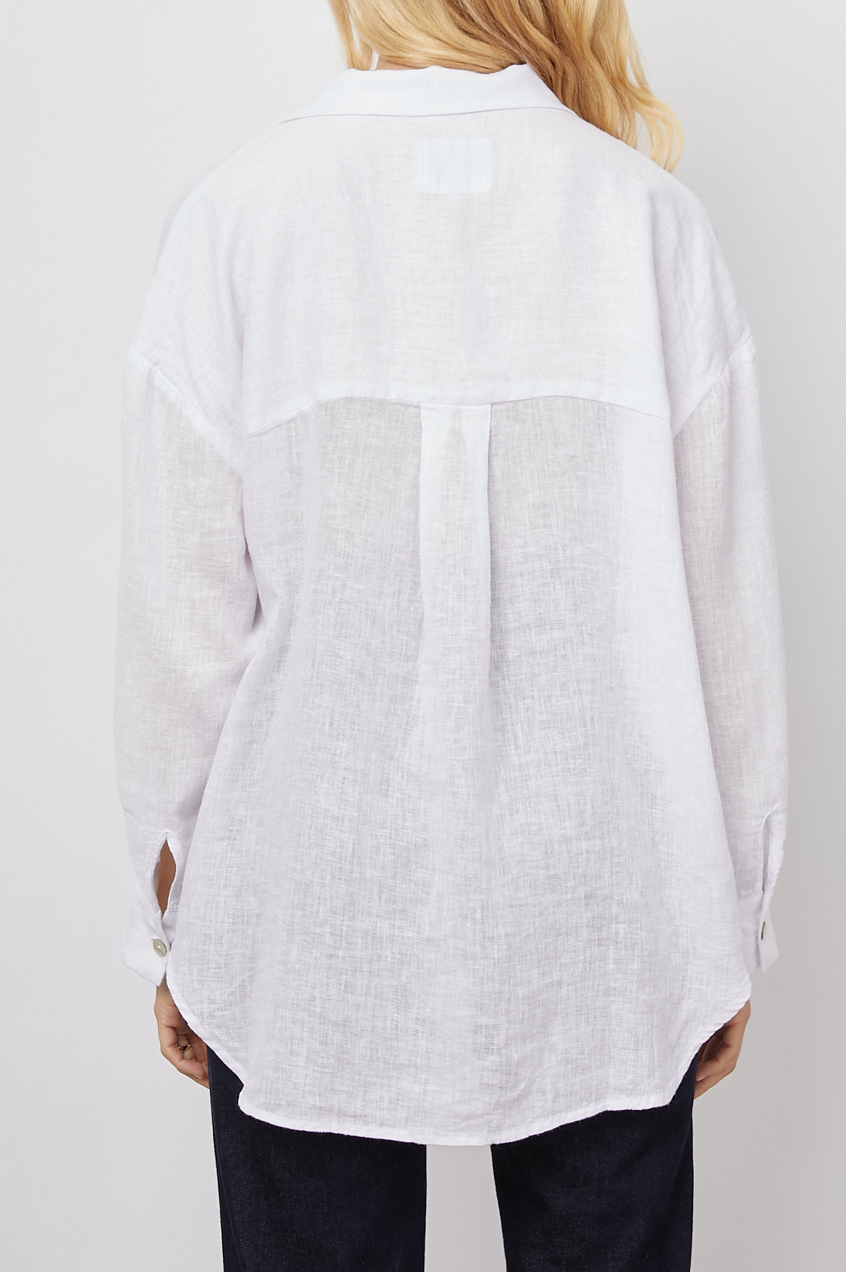 Jocelyn Long-Sleeve Shirt with Button Cuffs, a Collar and a V Neck with a Half-Sealed Placket in White Colorway - Back View Featured on Model 